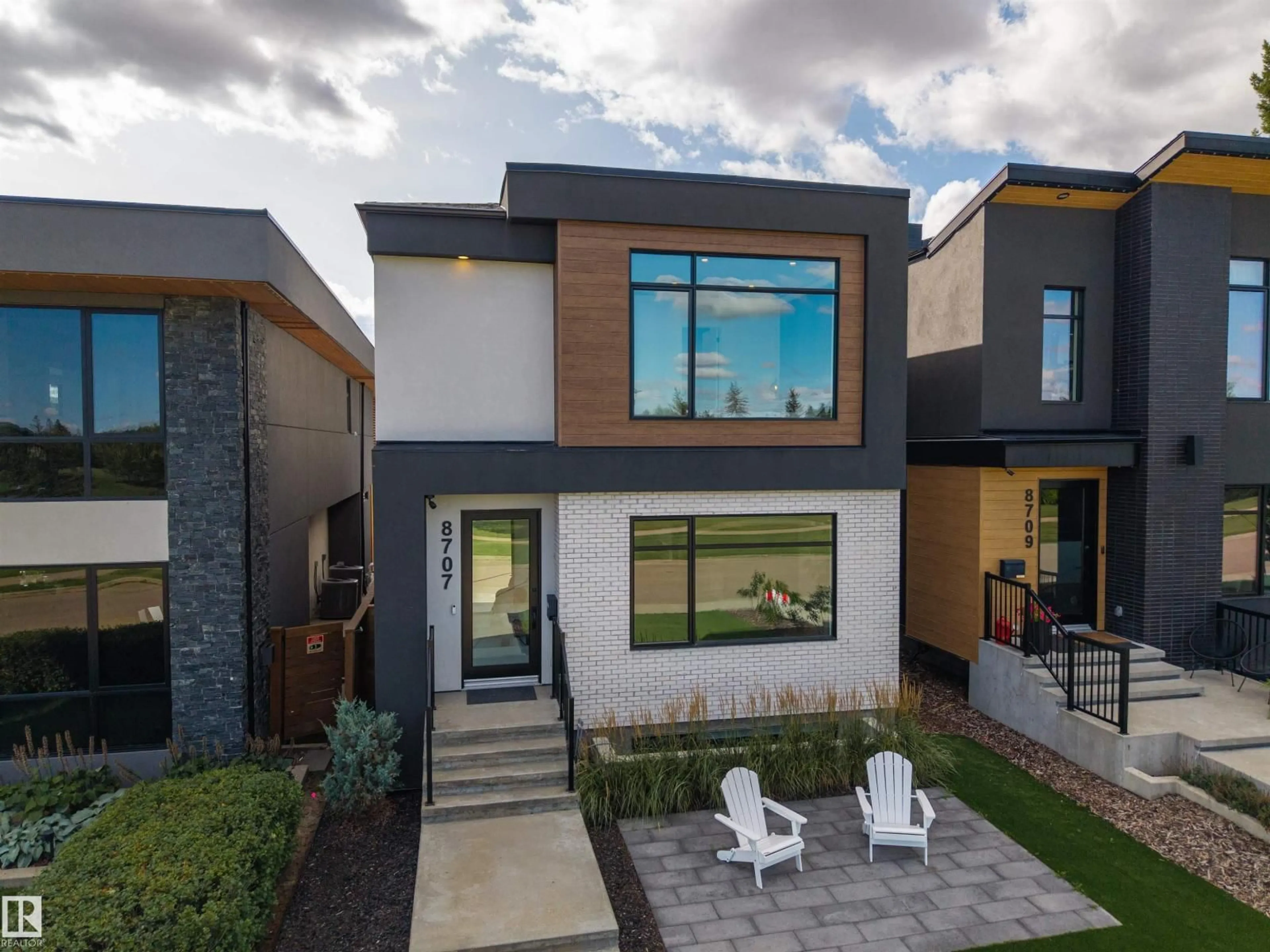 Home with brick exterior material, street for 8707 STRATHEARN CR, Edmonton Alberta T6C4C5