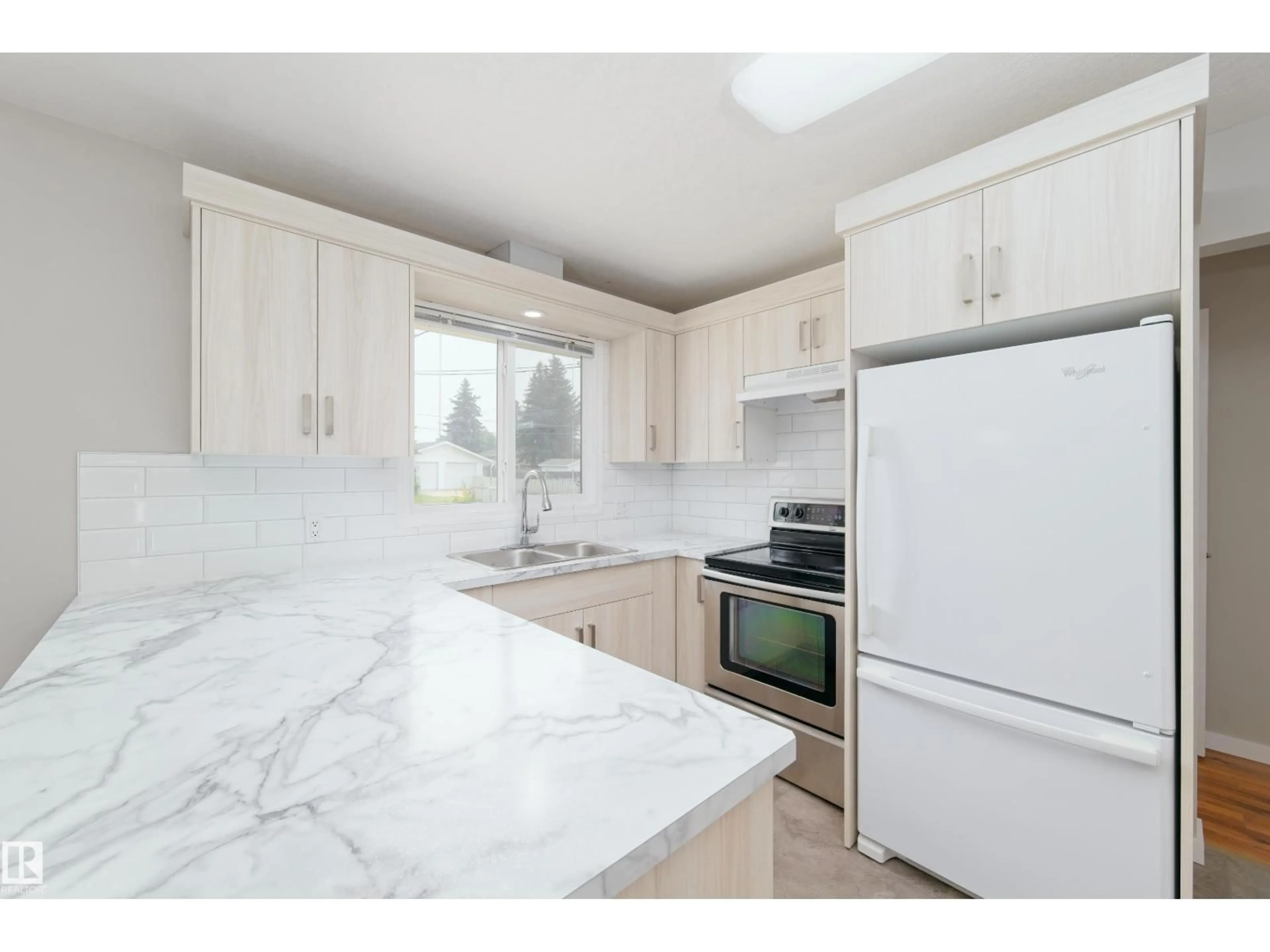 Open concept kitchen, ceramic/tile floor for 5313 57 ST, Barrhead Alberta T7N1N4