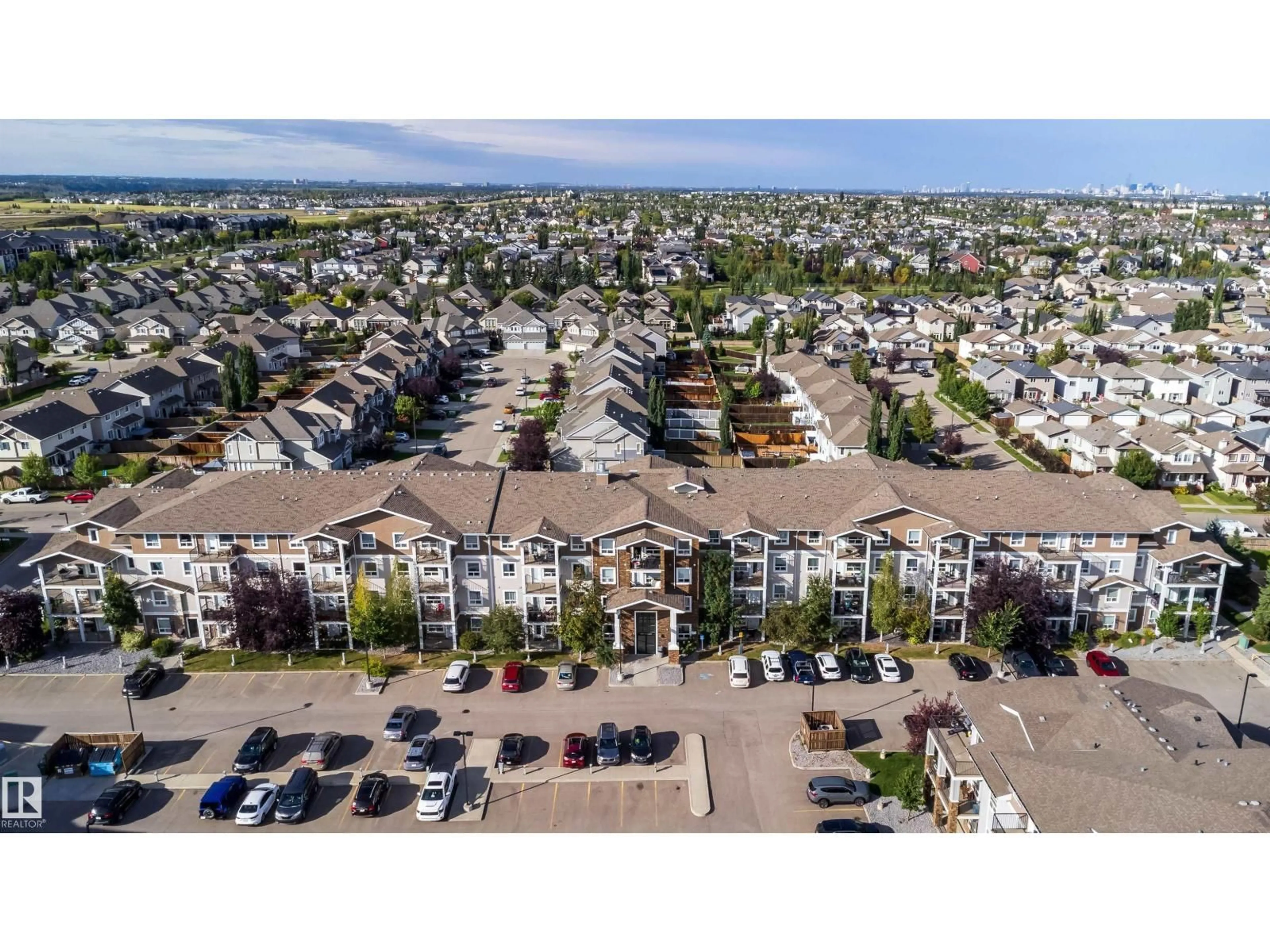 A pic from outside/outdoor area/front of a property/back of a property/a pic from drone, mountain view for 9351 - 3114 SIMPSO DR NW, Edmonton Alberta T6R0N4