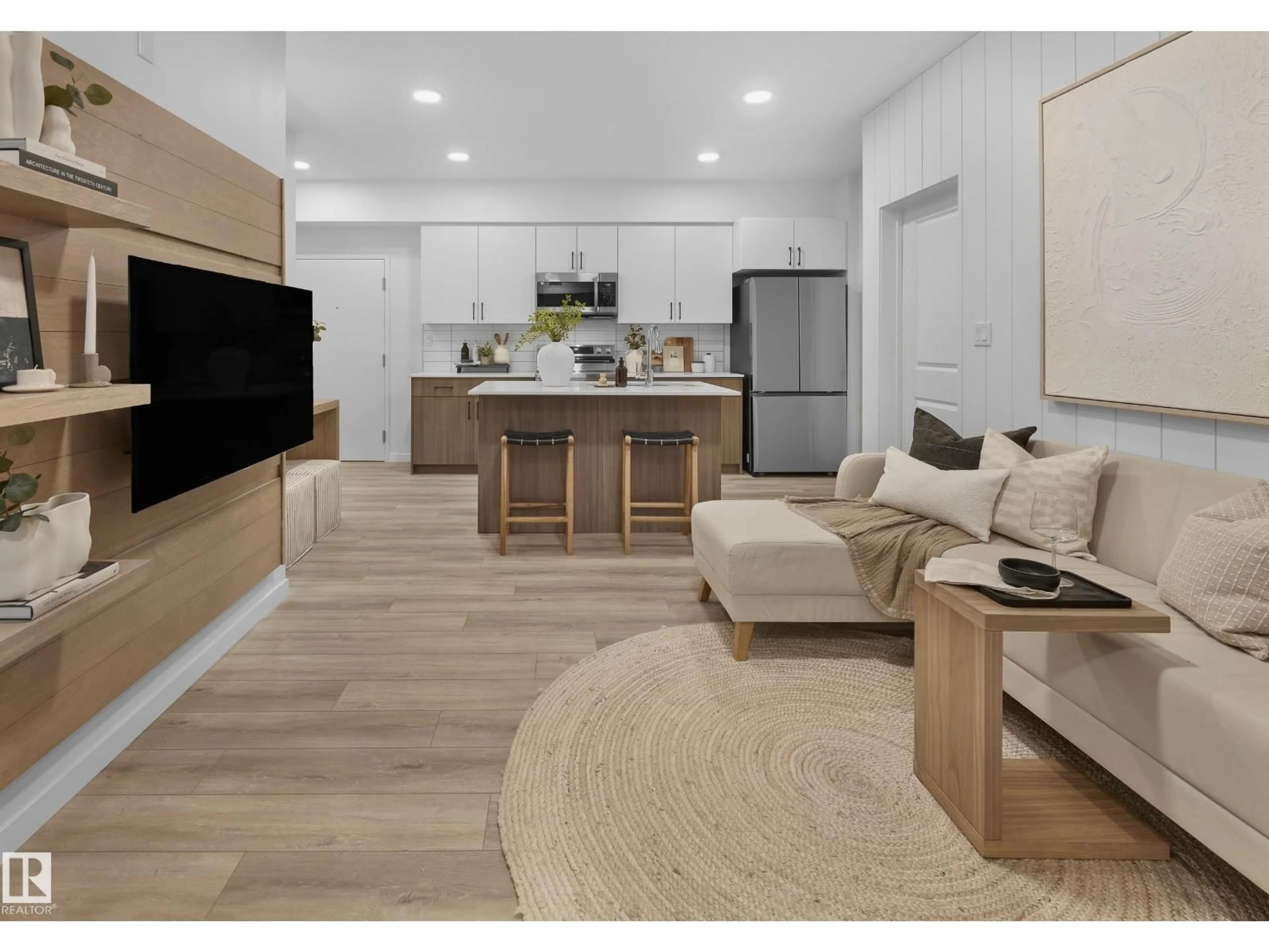 Open concept kitchen, wood/laminate floor for #105 - 3715 141 ST, Edmonton Alberta T6W5M9