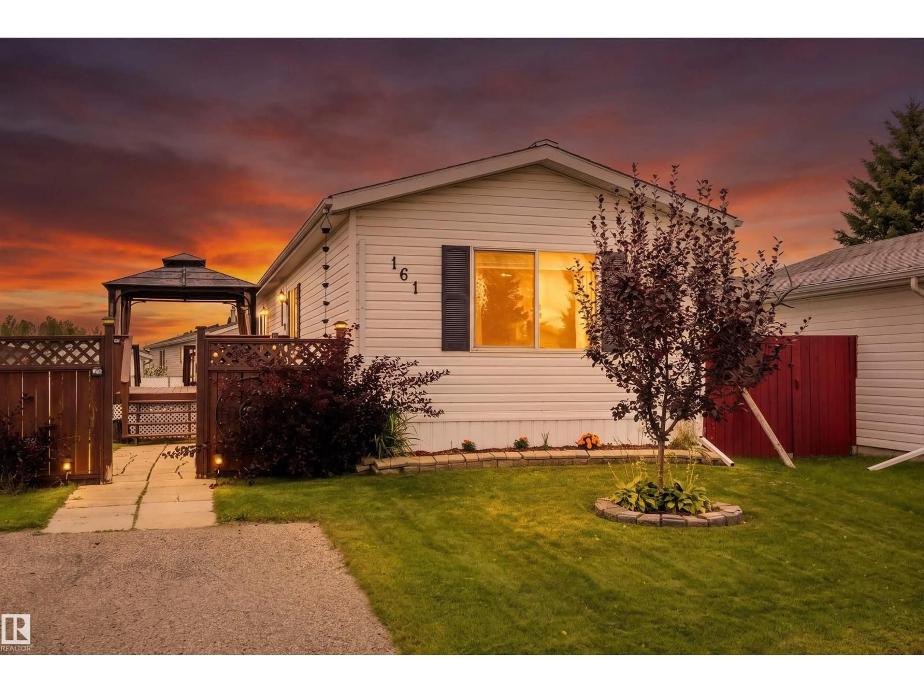 Home with vinyl exterior material, street for 161 - 3400 48 ST, Stony Plain Alberta T7Z1R9