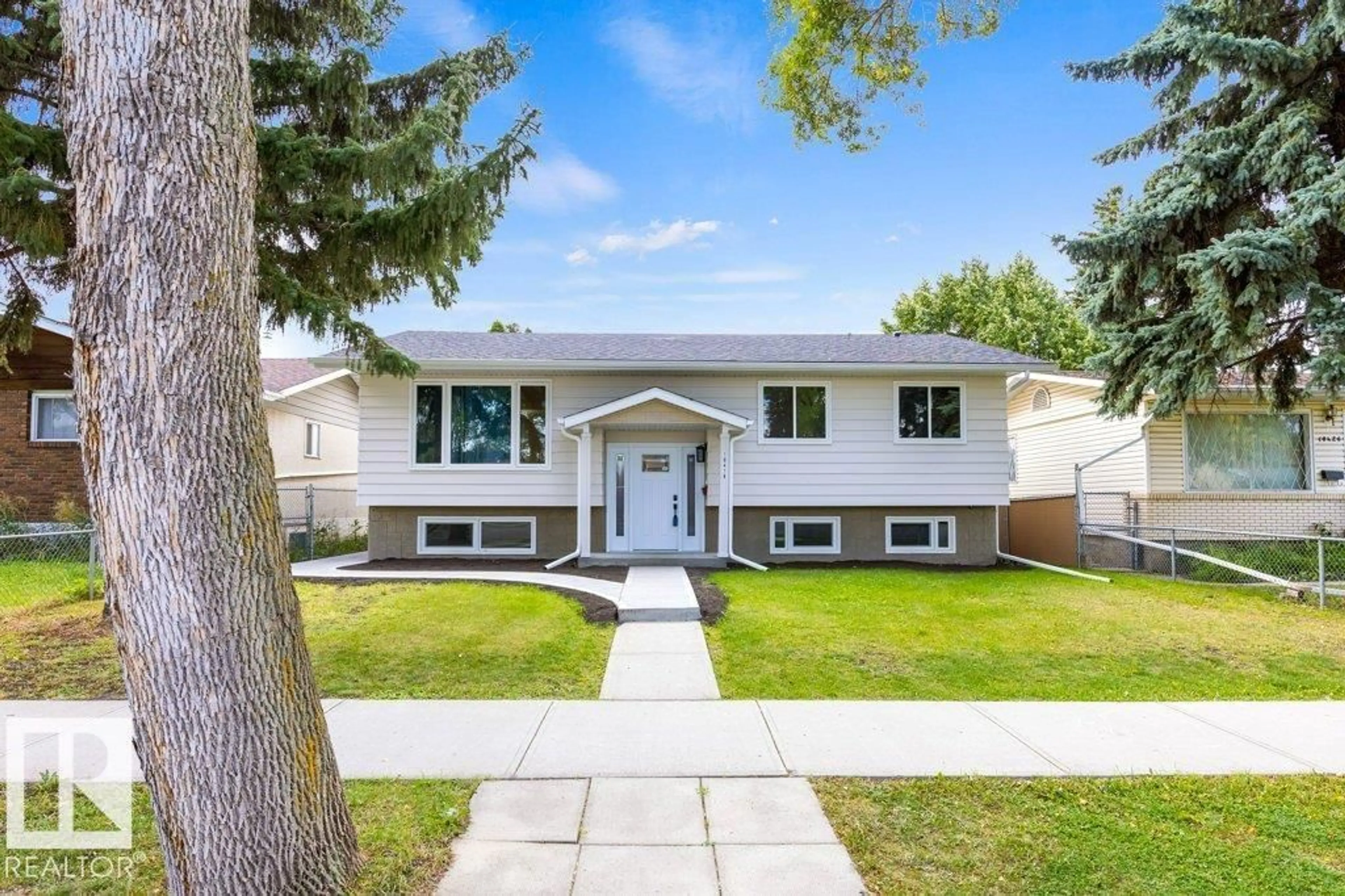 Home with vinyl exterior material, street for 10418 154 ST, Edmonton Alberta T5P2H8