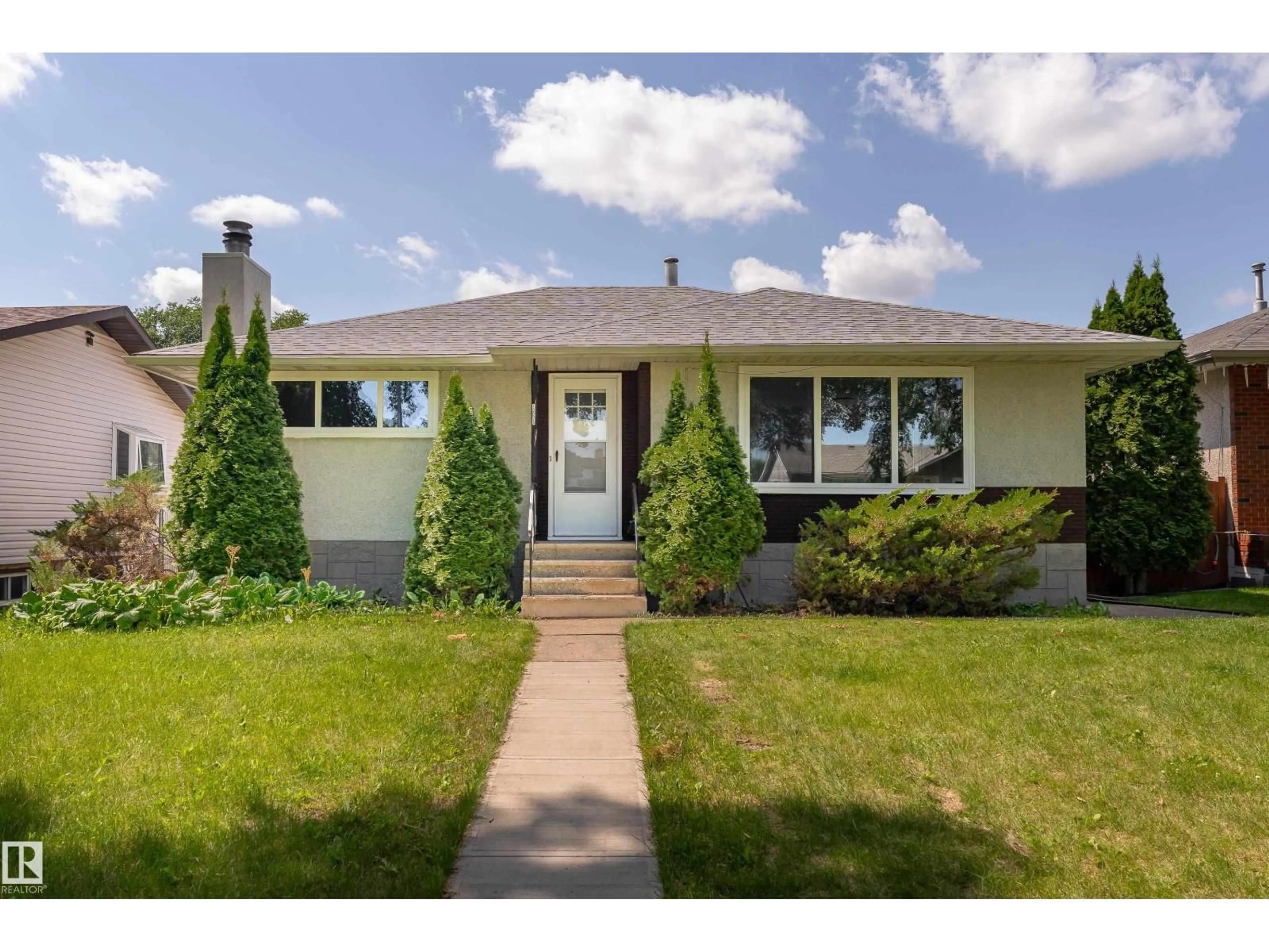 Home with vinyl exterior material, street for NW - 12224 55 ST, Edmonton Alberta T5W3R4