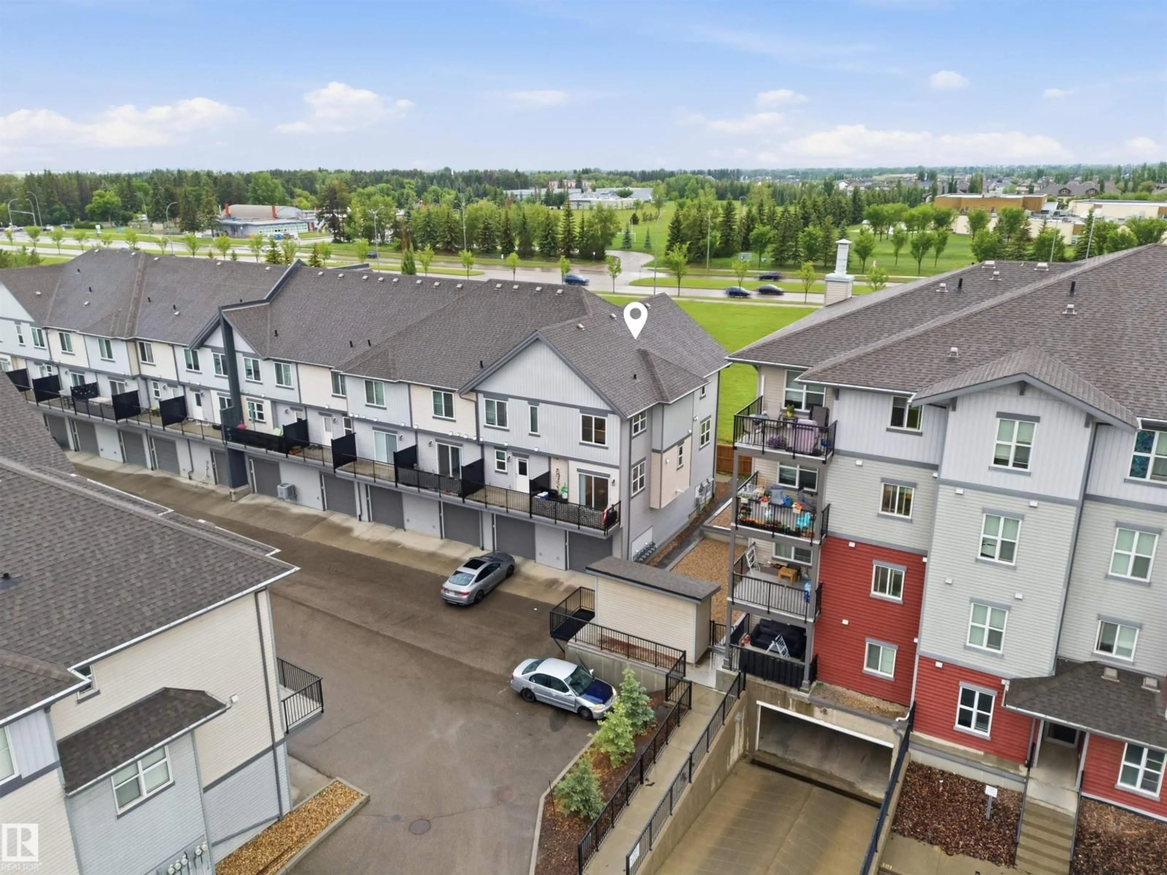 A pic from outside/outdoor area/front of a property/back of a property/a pic from drone, city buildings view from balcony for 655 WATT BV, Edmonton Alberta T6X0Y2