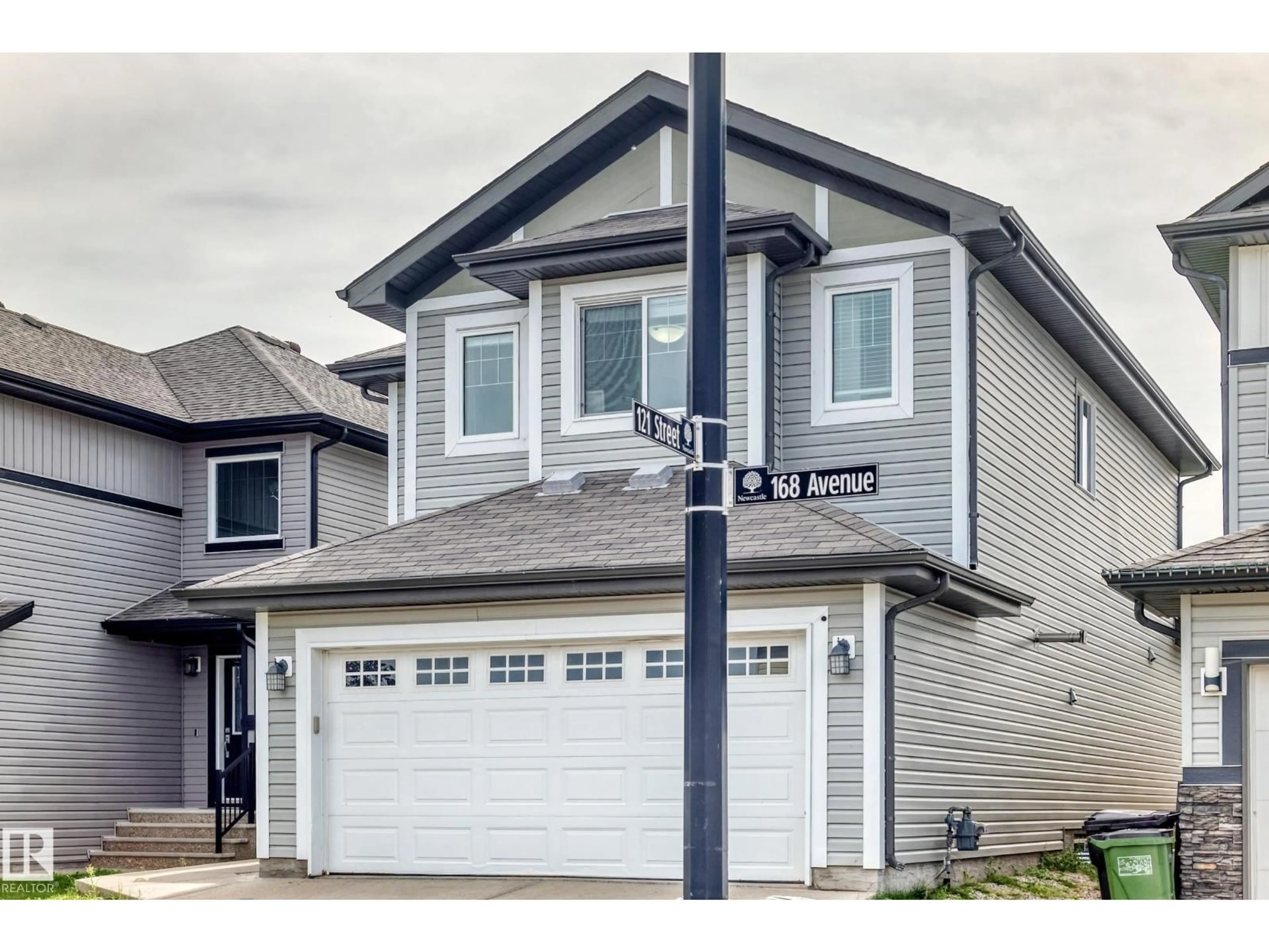 Home with vinyl exterior material, street for 12035 168 AV, Edmonton Alberta T5X0H8