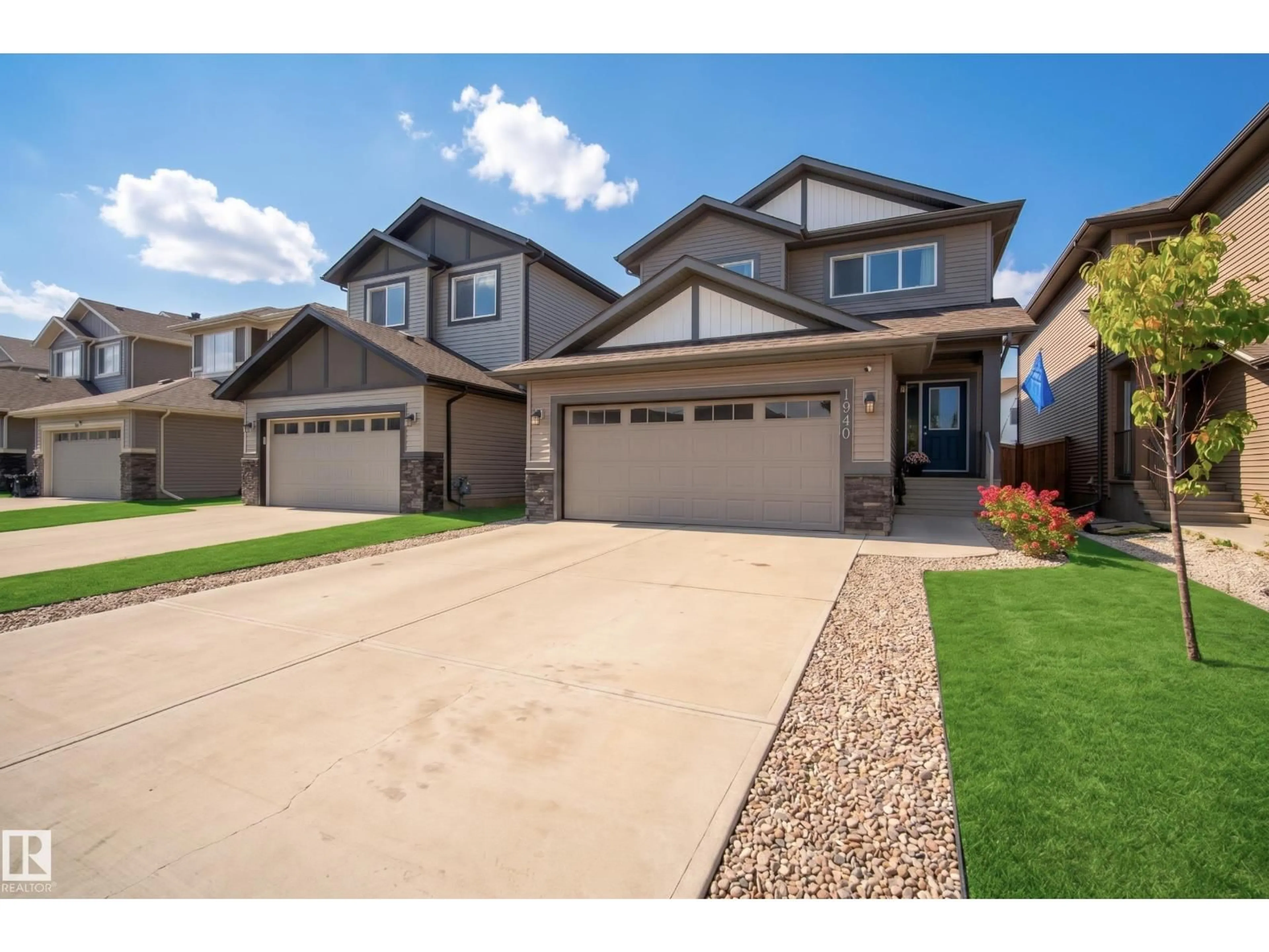 Home with brick exterior material, street for 1940 WESTERRA LN, Stony Plain Alberta T7Z0M9