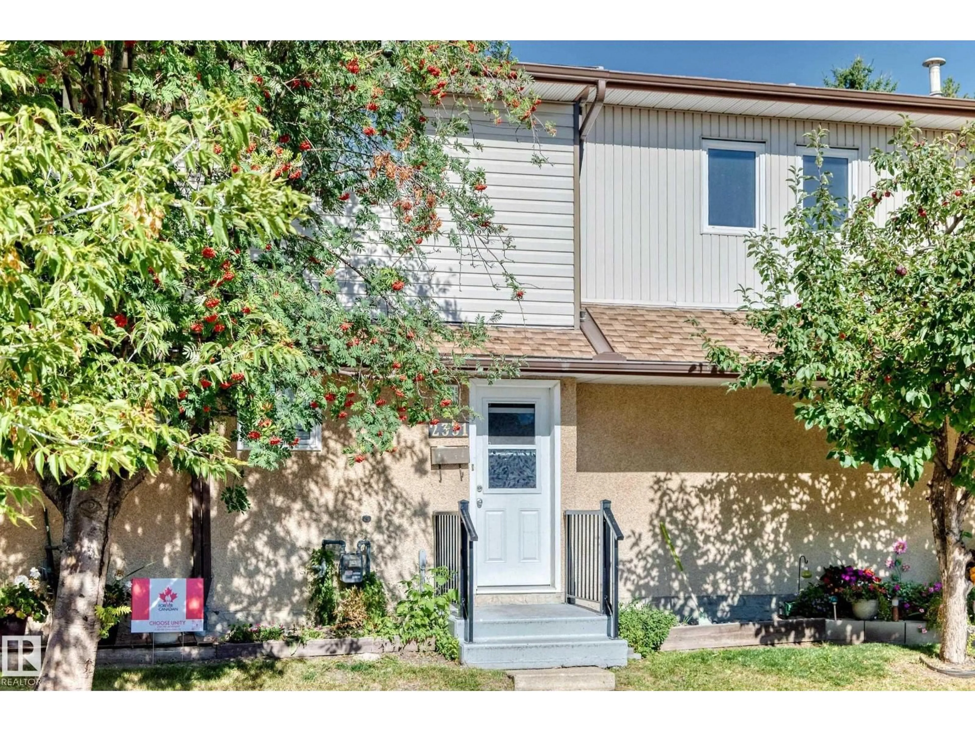 Home with vinyl exterior material, street for 2331 139 AVE AVE, Edmonton Alberta T5Y1S1