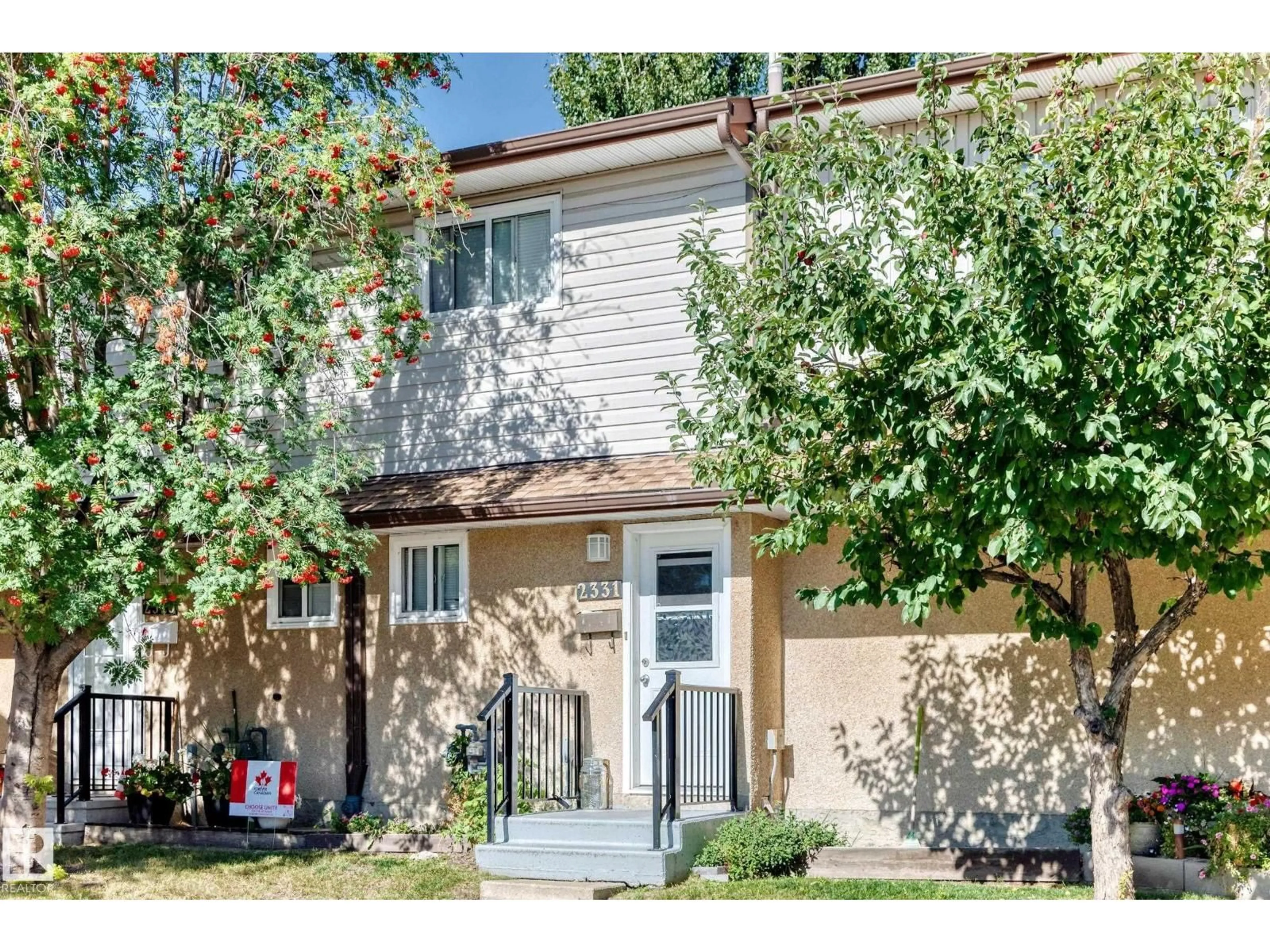 Home with vinyl exterior material, street for 2331 139 AVE AVE, Edmonton Alberta T5Y1S1