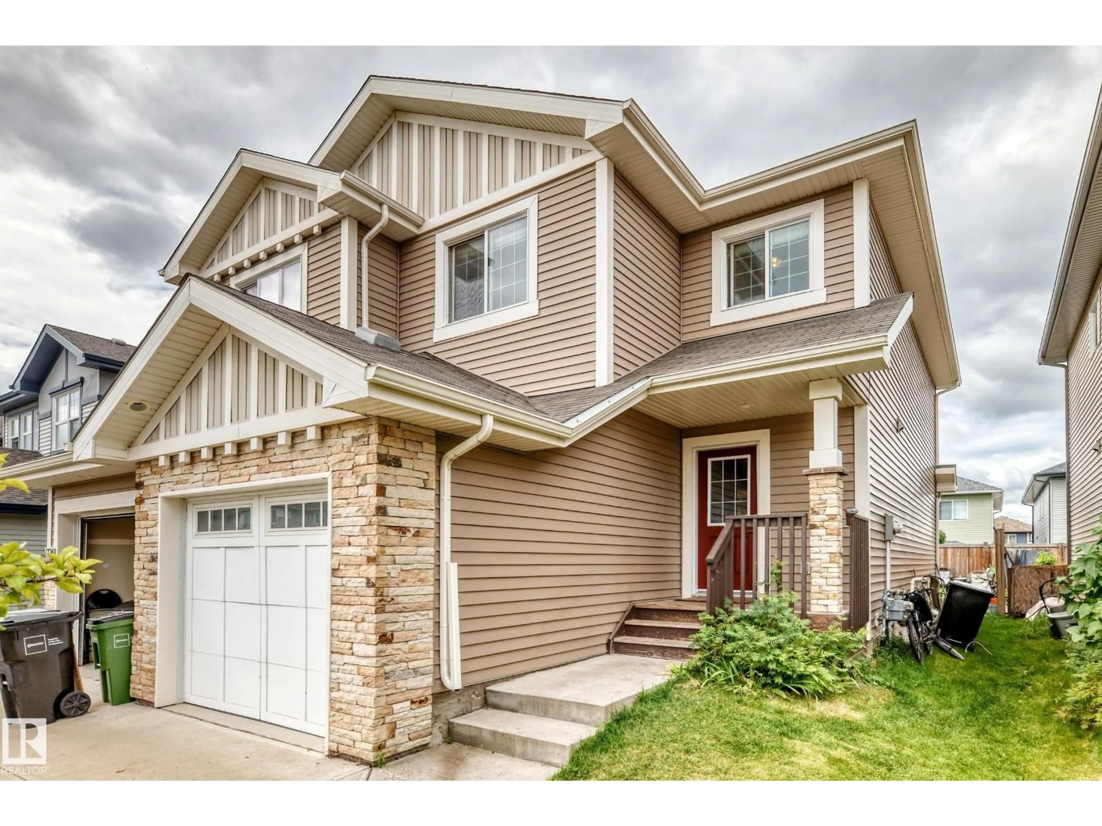 Home with vinyl exterior material, street for 17250 73 ST, Edmonton Alberta T5Z0L3