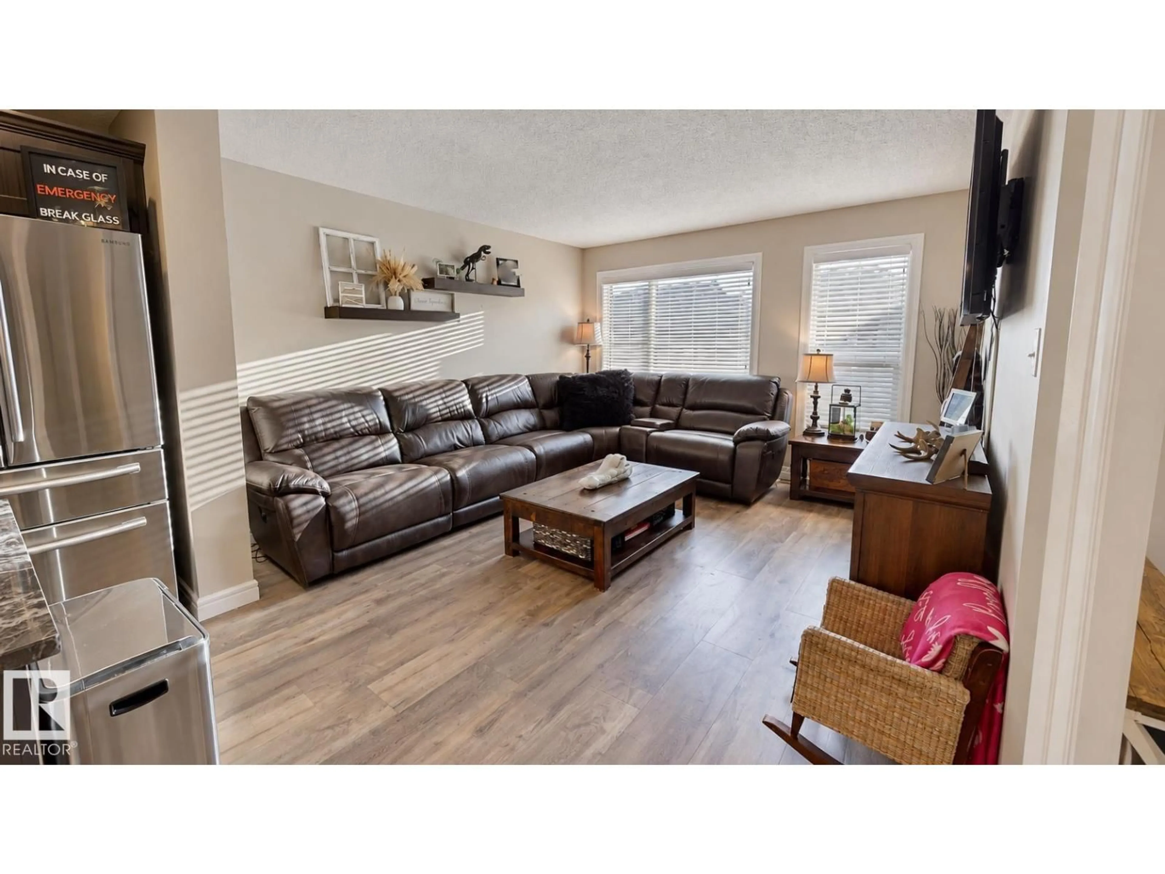 Living room with furniture, wood/laminate floor for 56 TRIBUTE CM, Spruce Grove Alberta T7X0W6