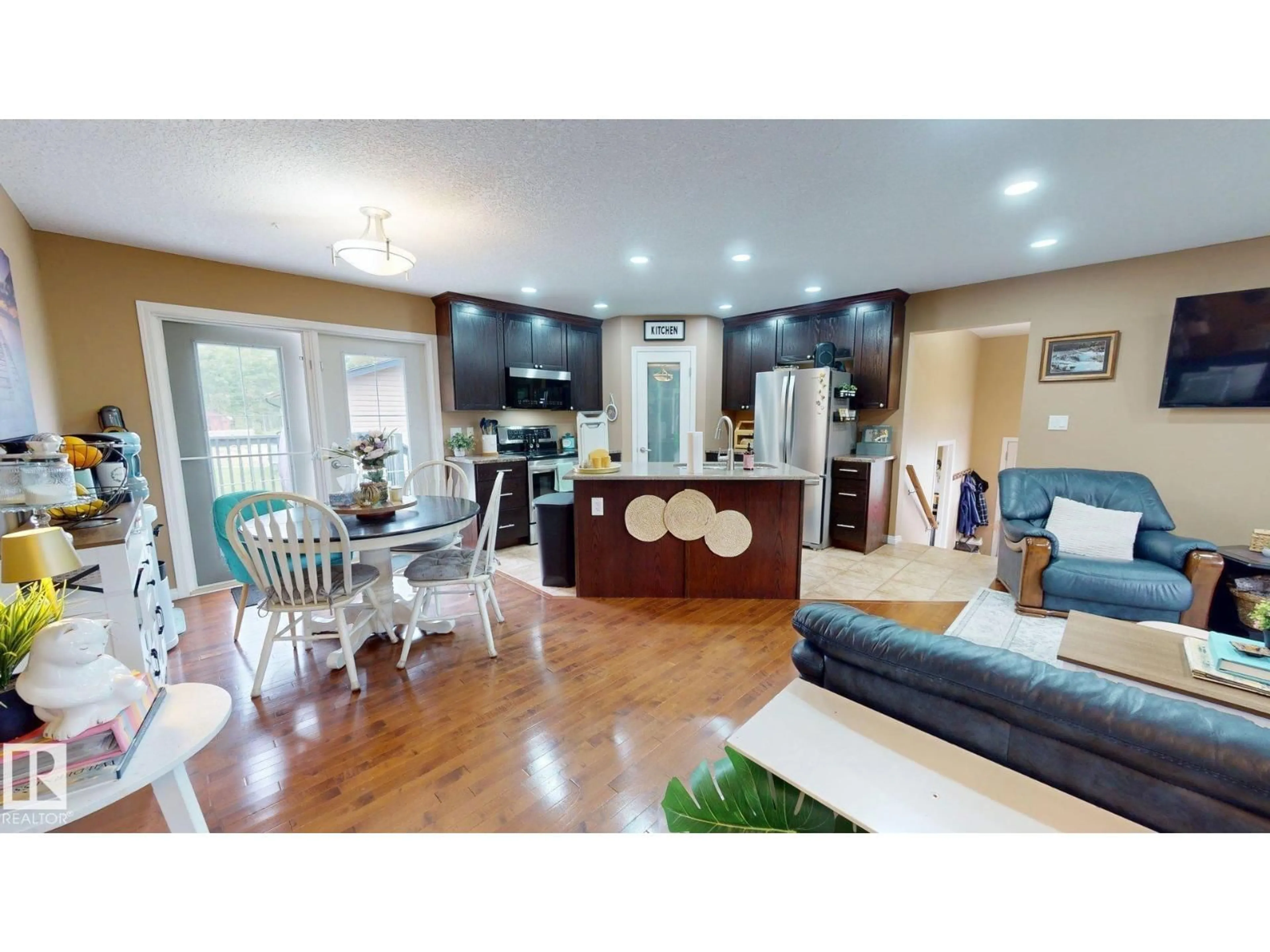 Open concept kitchen, wood/laminate floor for 327 50419 RANGE RD, Rural Beaver County Alberta T0B4J2