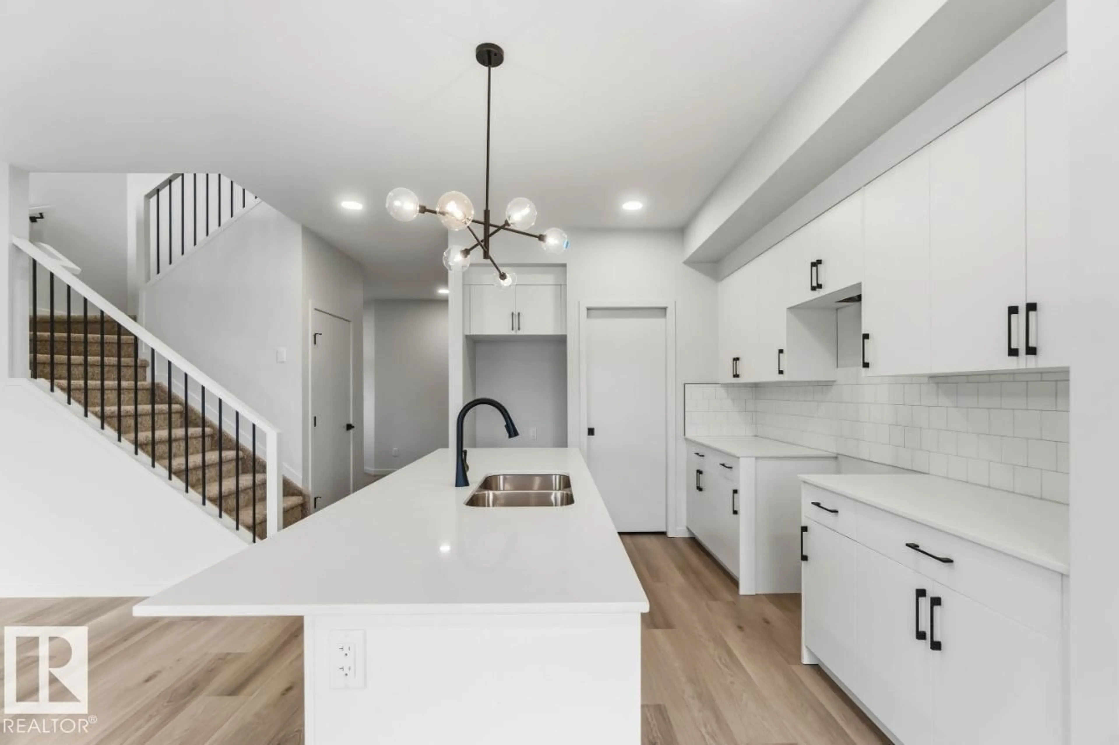 Open concept kitchen, ceramic/tile floor for 5517 69 ST, Beaumont Alberta T4X2Z7
