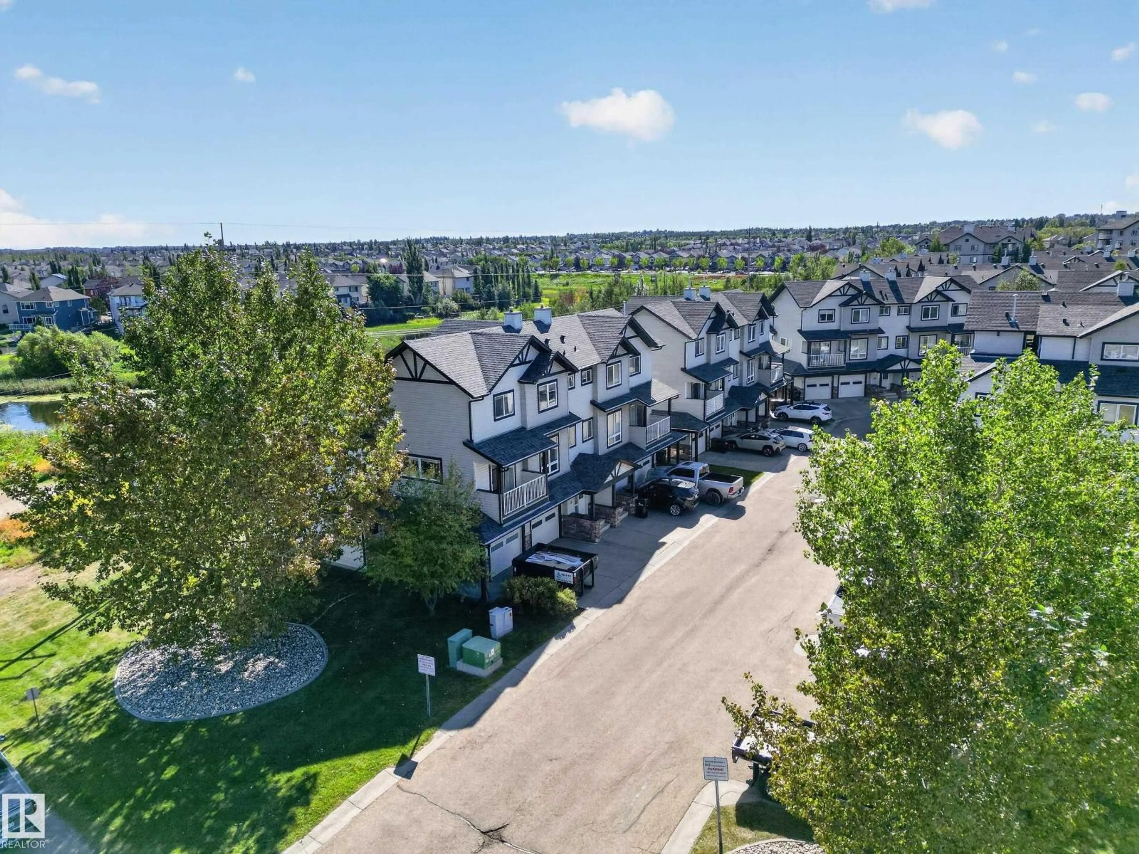 A pic from outside/outdoor area/front of a property/back of a property/a pic from drone, unknown for 11 - 3 CLOVER BAR LN, Sherwood Park Alberta T8H0C4