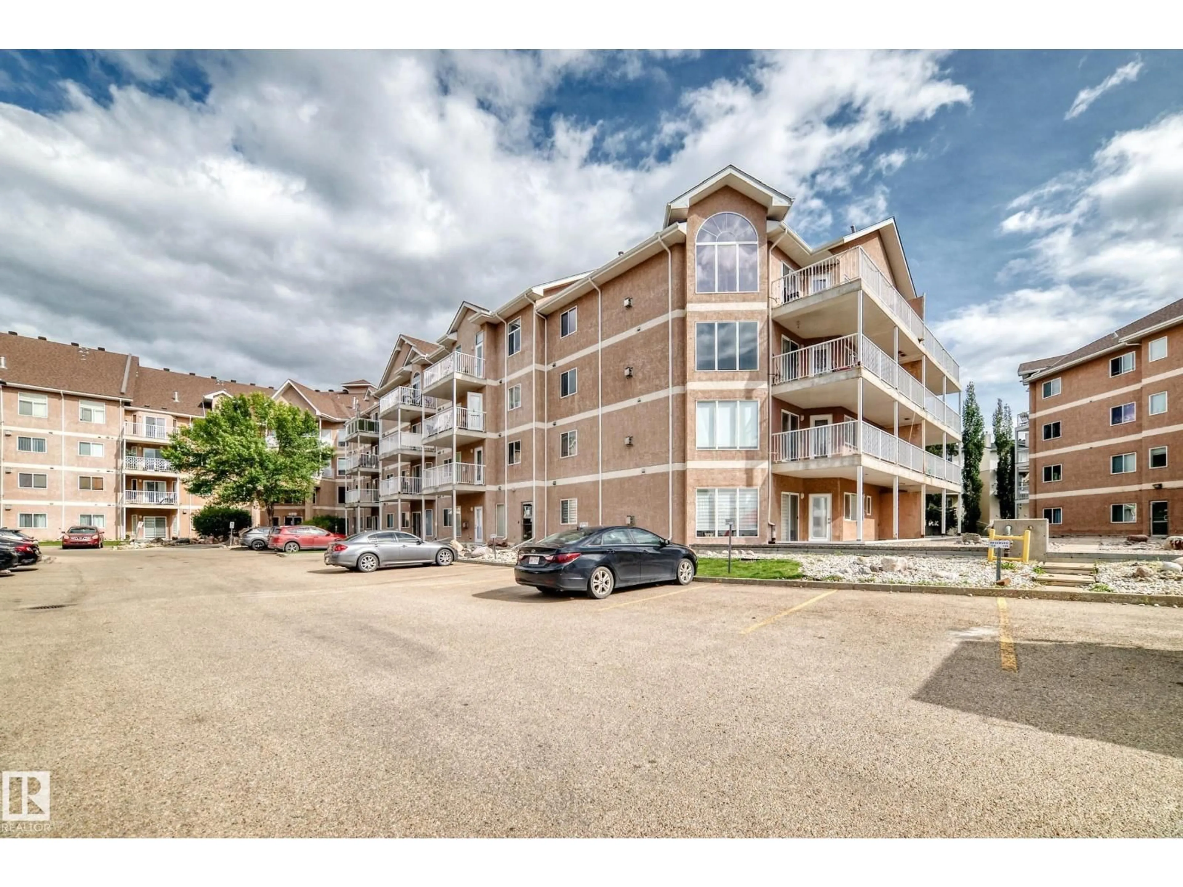 A pic from outside/outdoor area/front of a property/back of a property/a pic from drone, unknown for 316 - 4312 139 AV, Edmonton Alberta T5Y3J4