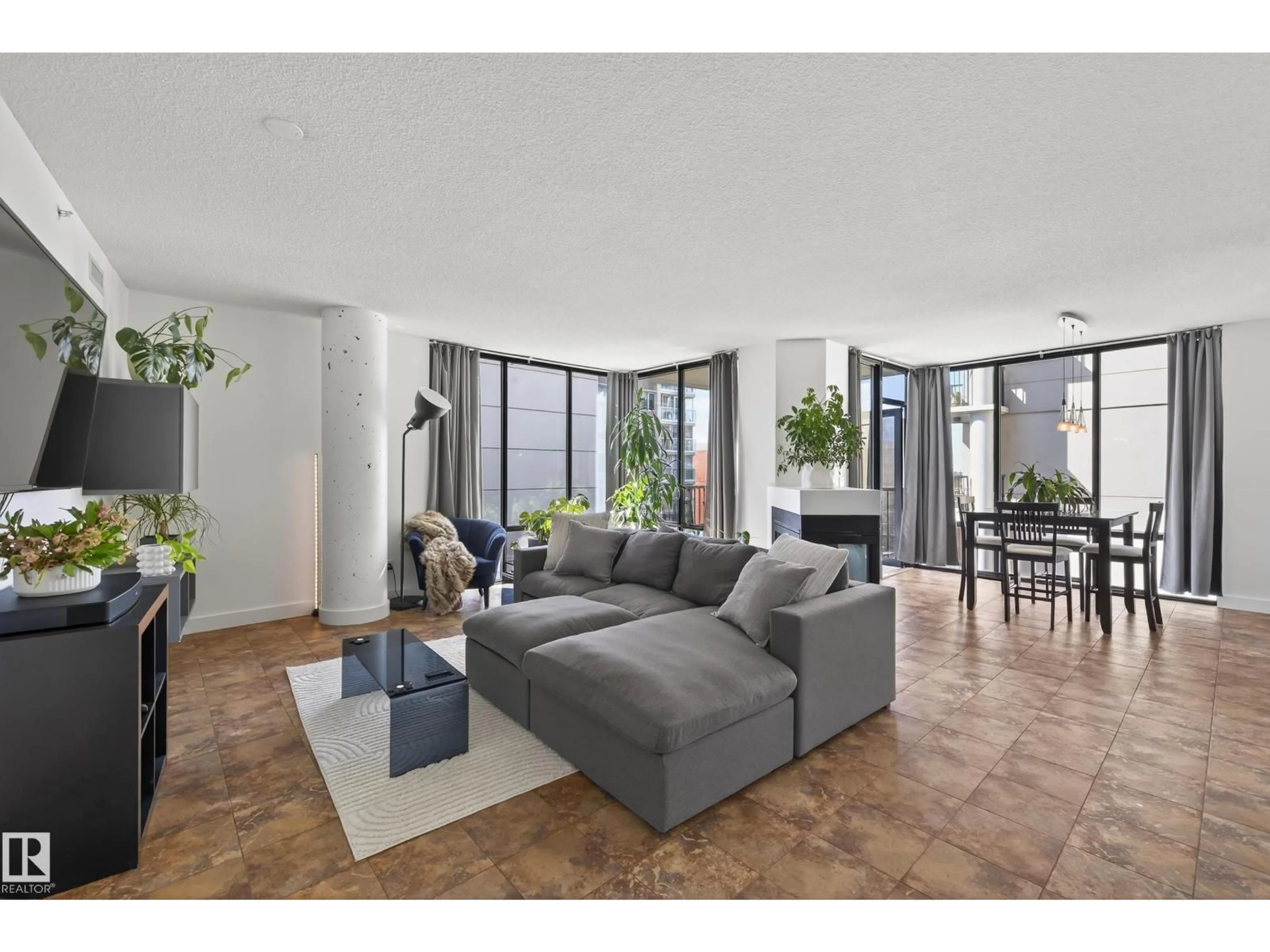 Living room with furniture, unknown for 701 - 10028 119 ST, Edmonton Alberta T5K1Y8