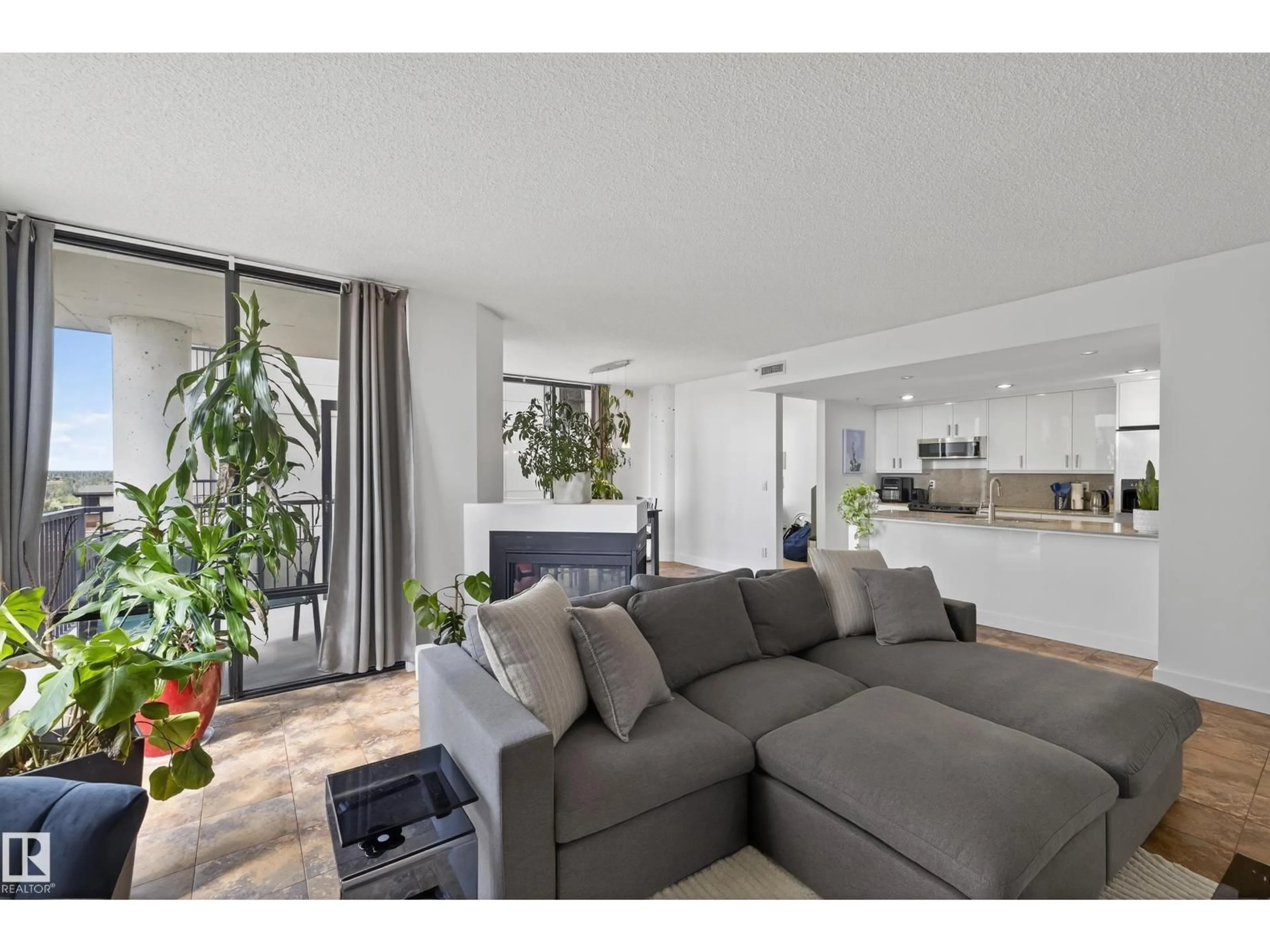 Living room with furniture, unknown for 701 - 10028 119 ST, Edmonton Alberta T5K1Y8