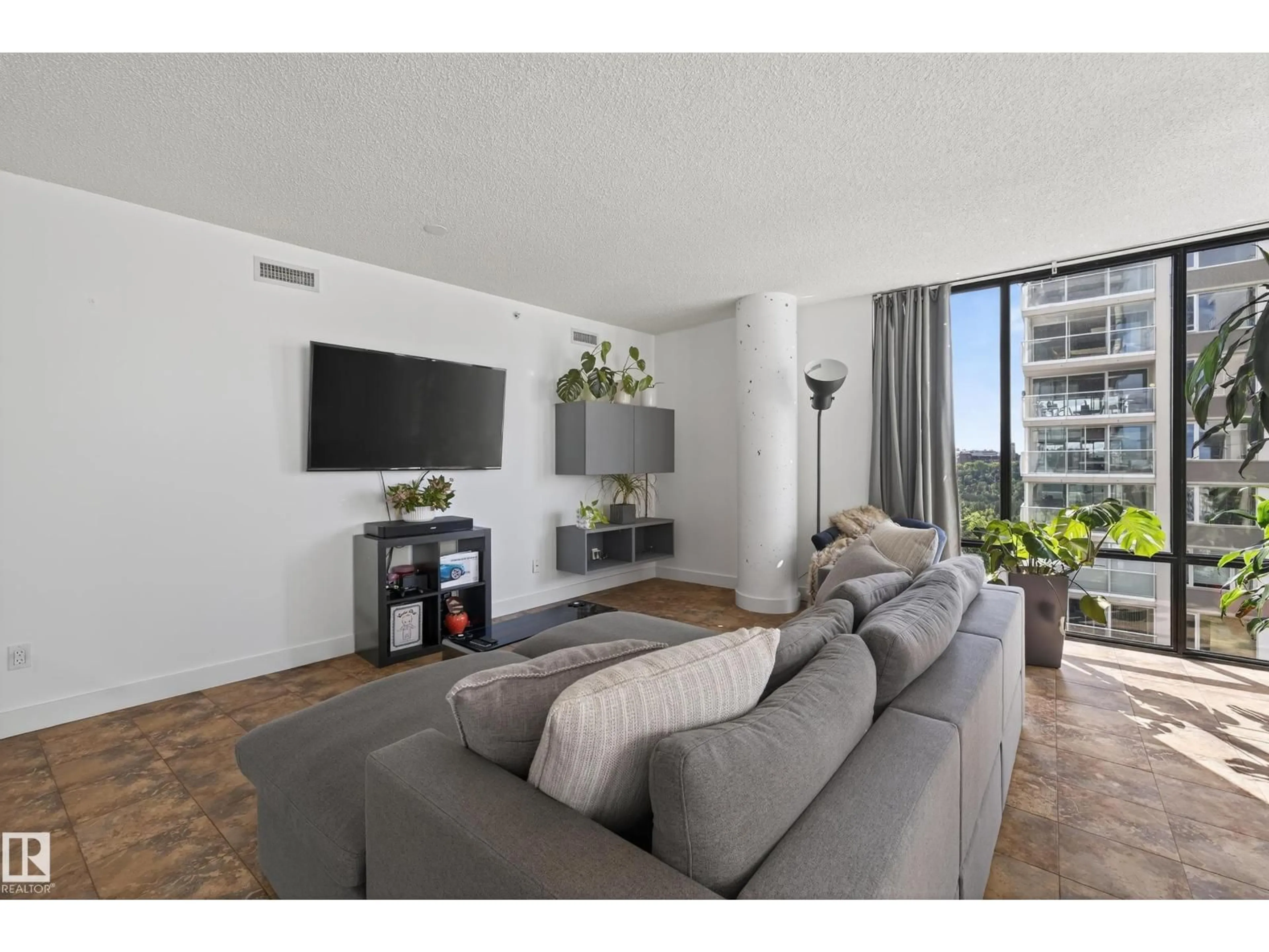Living room with furniture, unknown for 701 - 10028 119 ST, Edmonton Alberta T5K1Y8