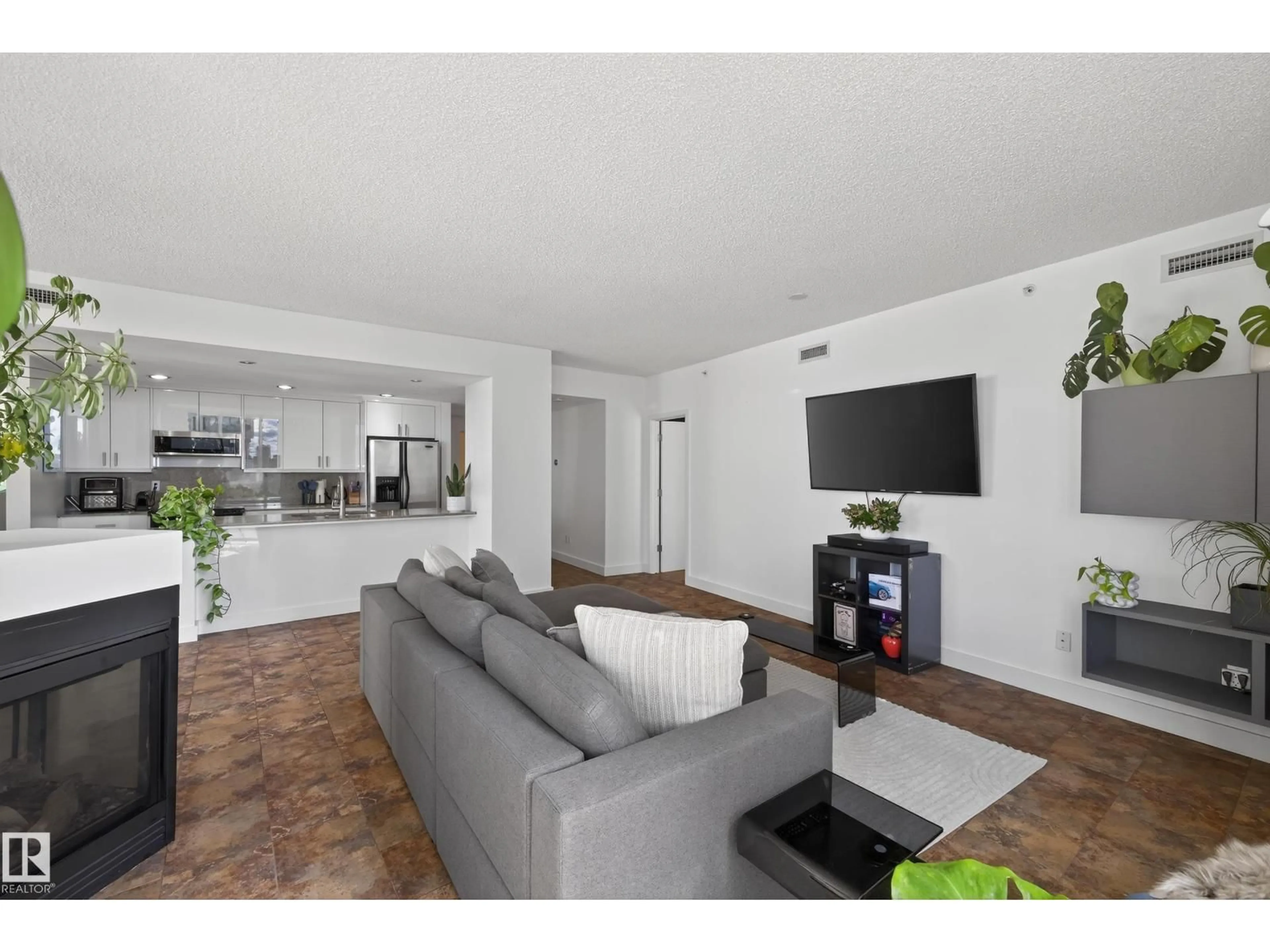Living room with furniture, unknown for 701 - 10028 119 ST, Edmonton Alberta T5K1Y8