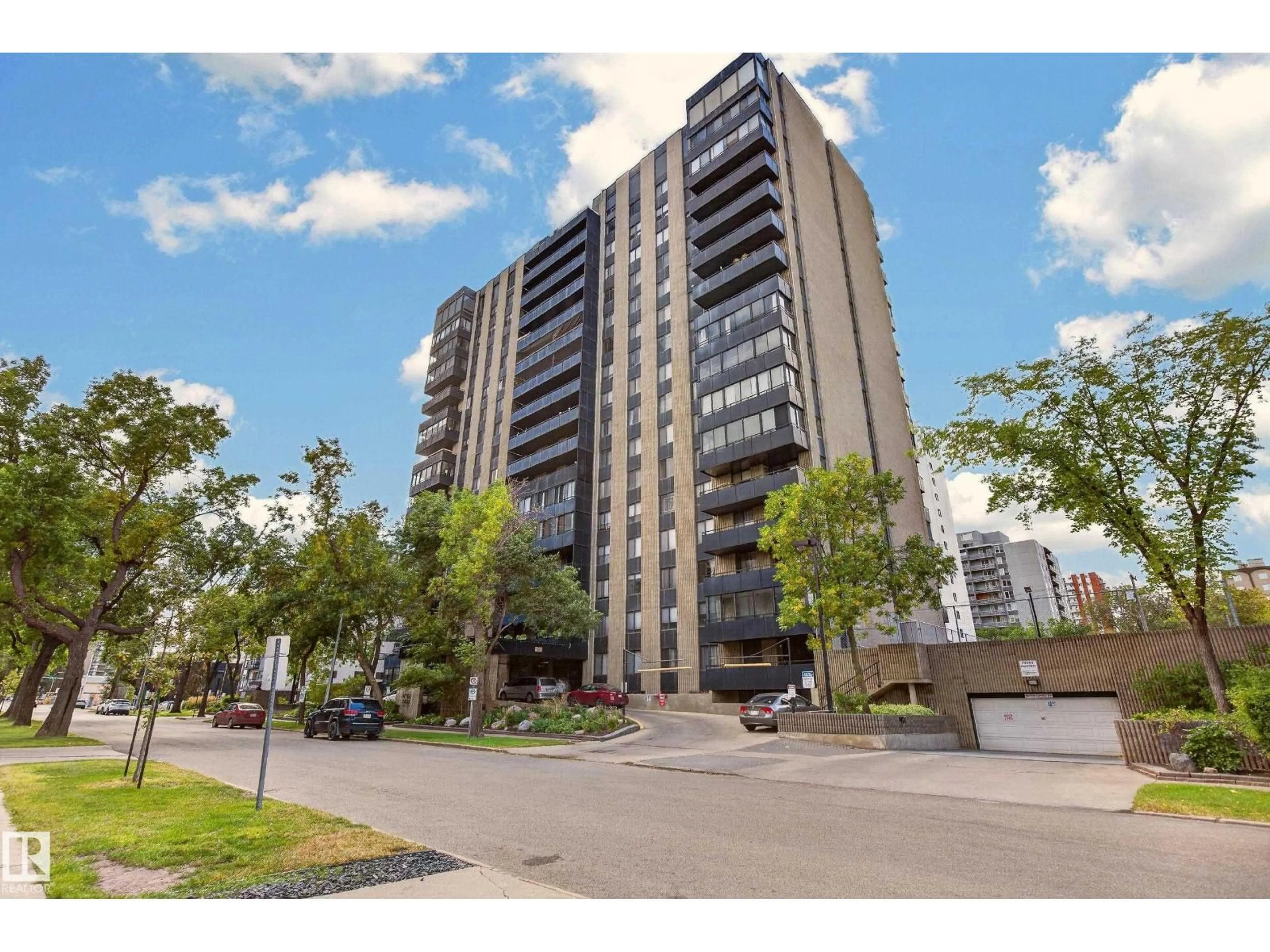 A pic from outside/outdoor area/front of a property/back of a property/a pic from drone, street for #105 - 10160 115 ST NW, Edmonton Alberta T5K1T6