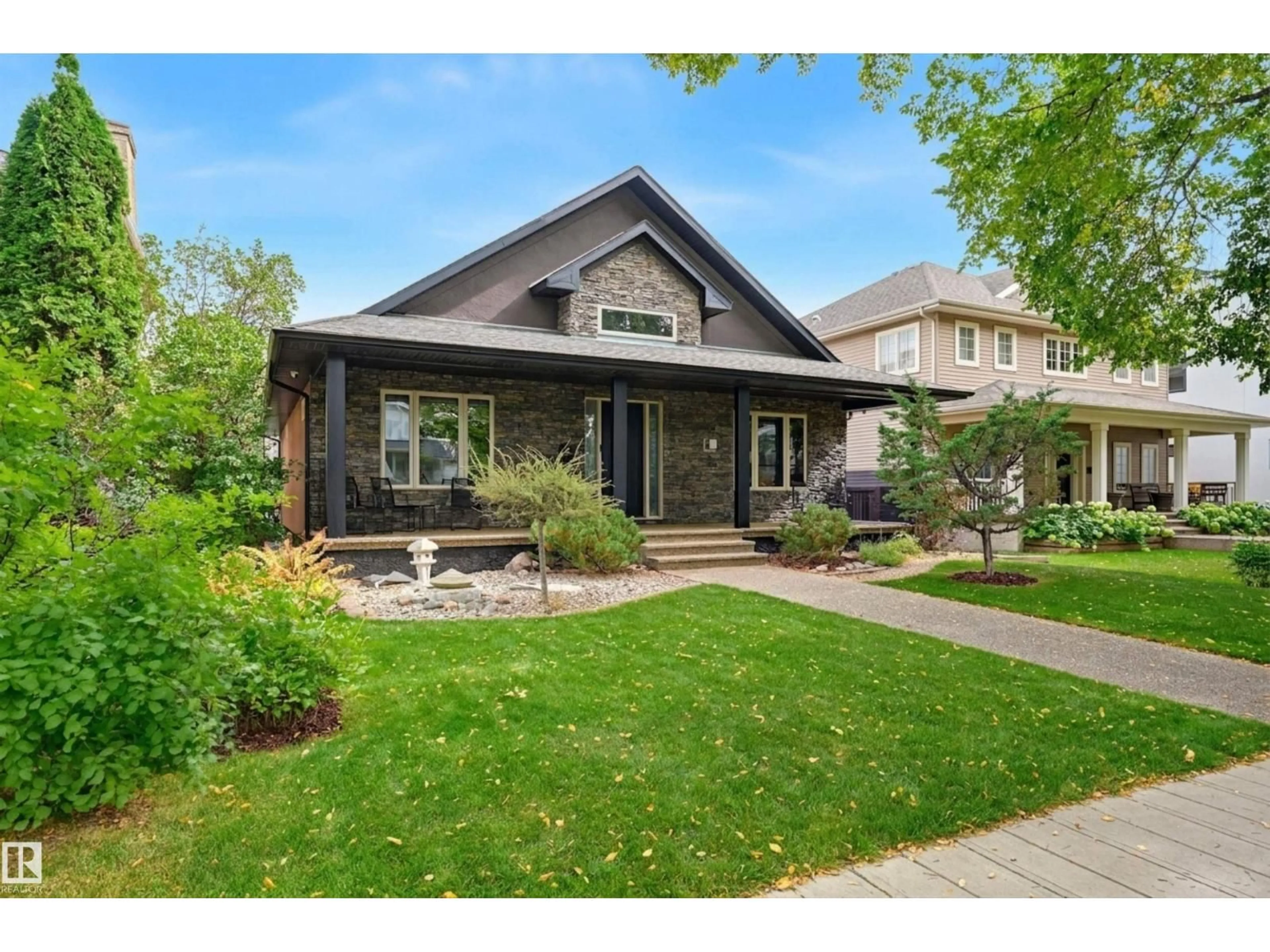 Home with brick exterior material, street for NW - 10427 134 ST, Edmonton Alberta T5N2B3