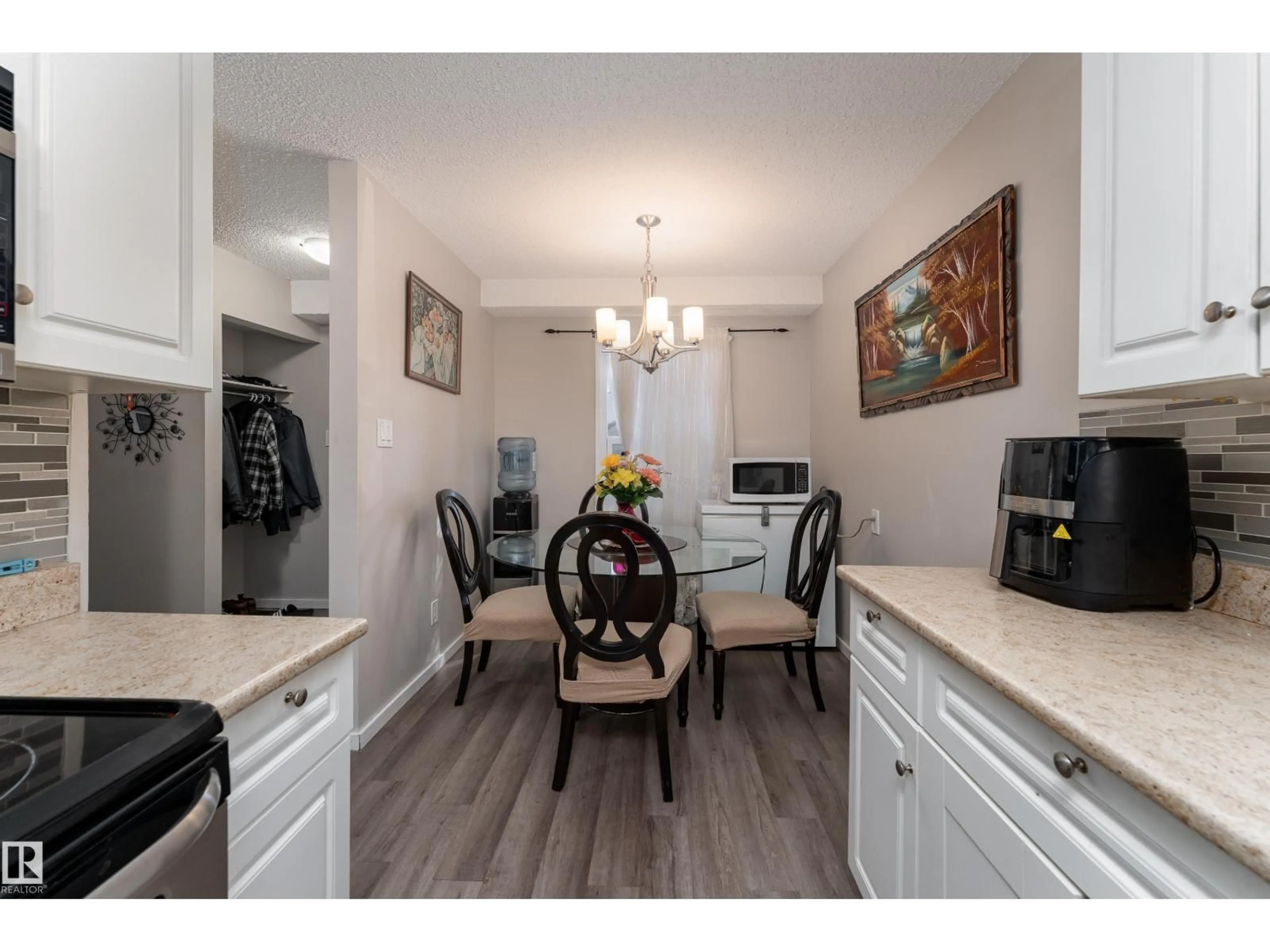 Open concept kitchen, wood/laminate floor for 66 WILLOWDALE PL, Edmonton Alberta T5T1Z4