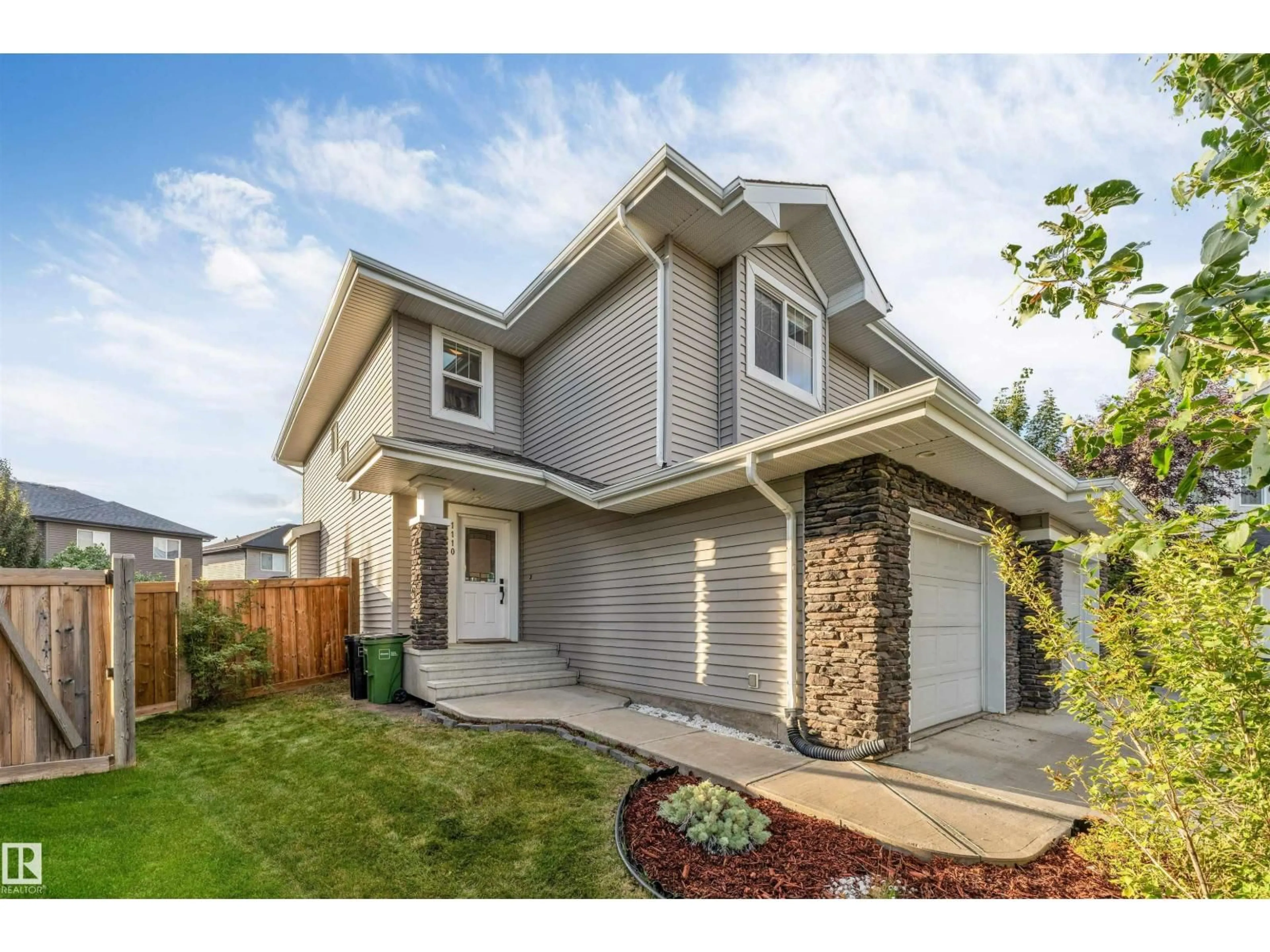 Home with vinyl exterior material, street for SW - 1110 176 ST, Edmonton Alberta T6W2B7