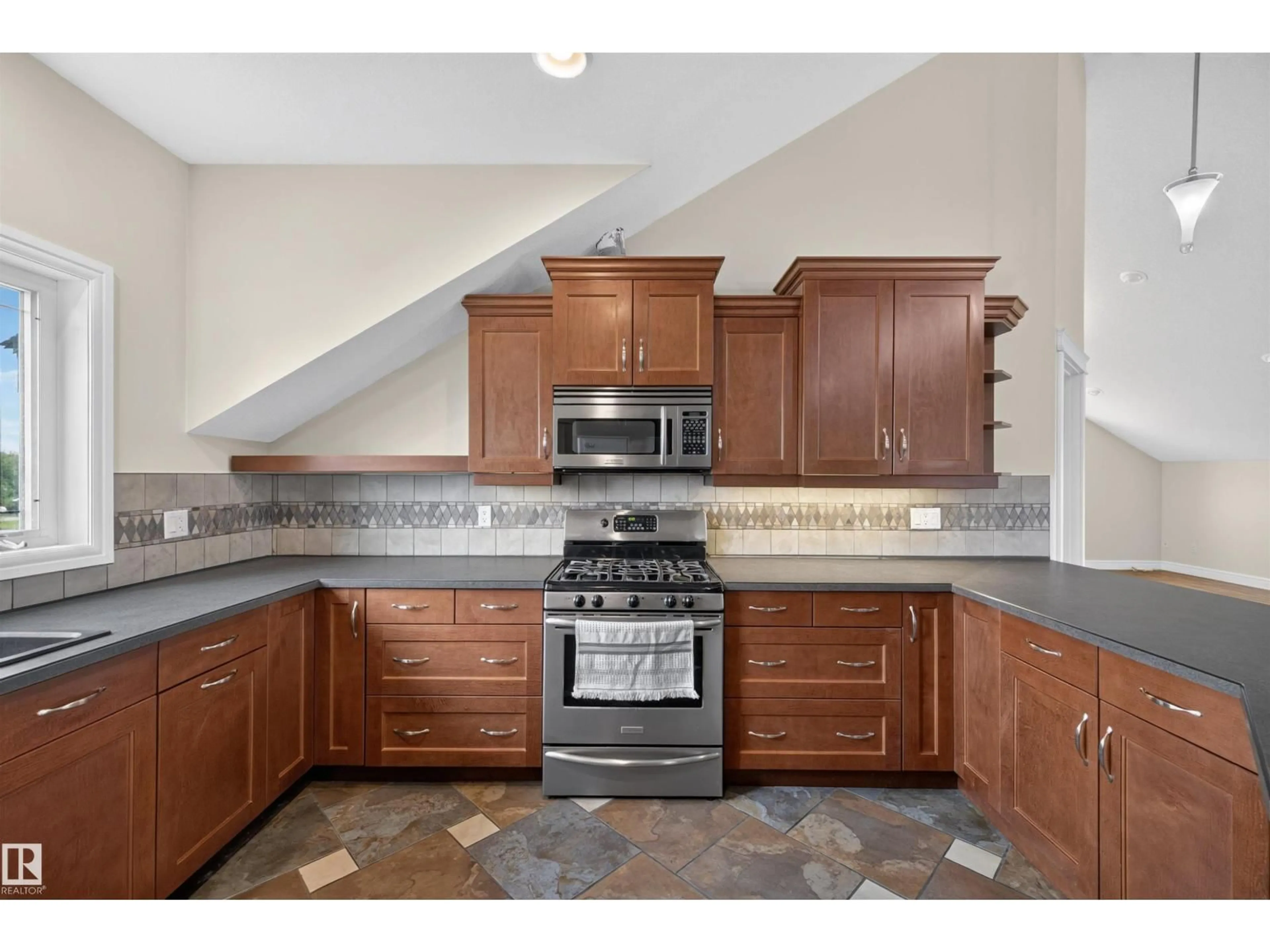 Standard kitchen, ceramic/tile floor for 50472 - 60 RNG RD, Rural Leduc County Alberta T4X0L1