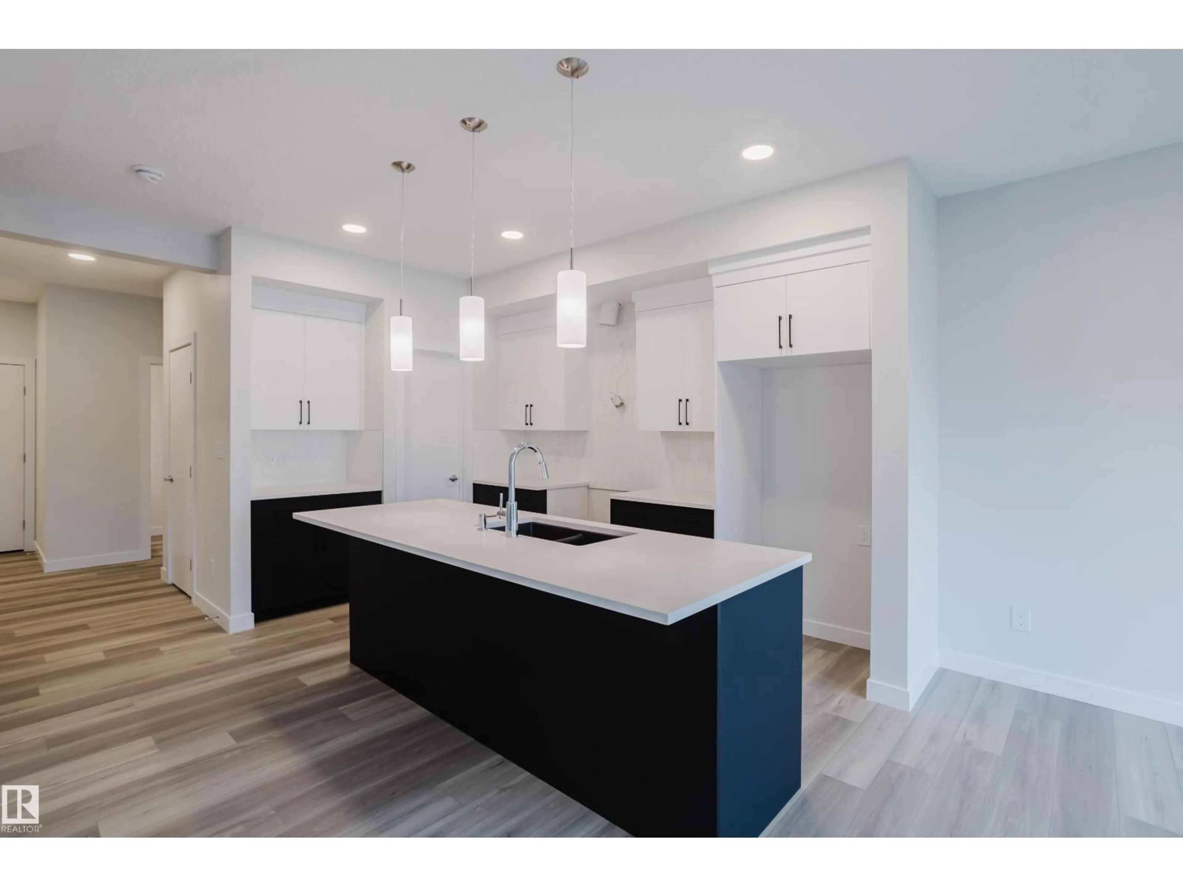 Open concept kitchen, unknown for 18647 19 AV, Edmonton Alberta T6M3M9