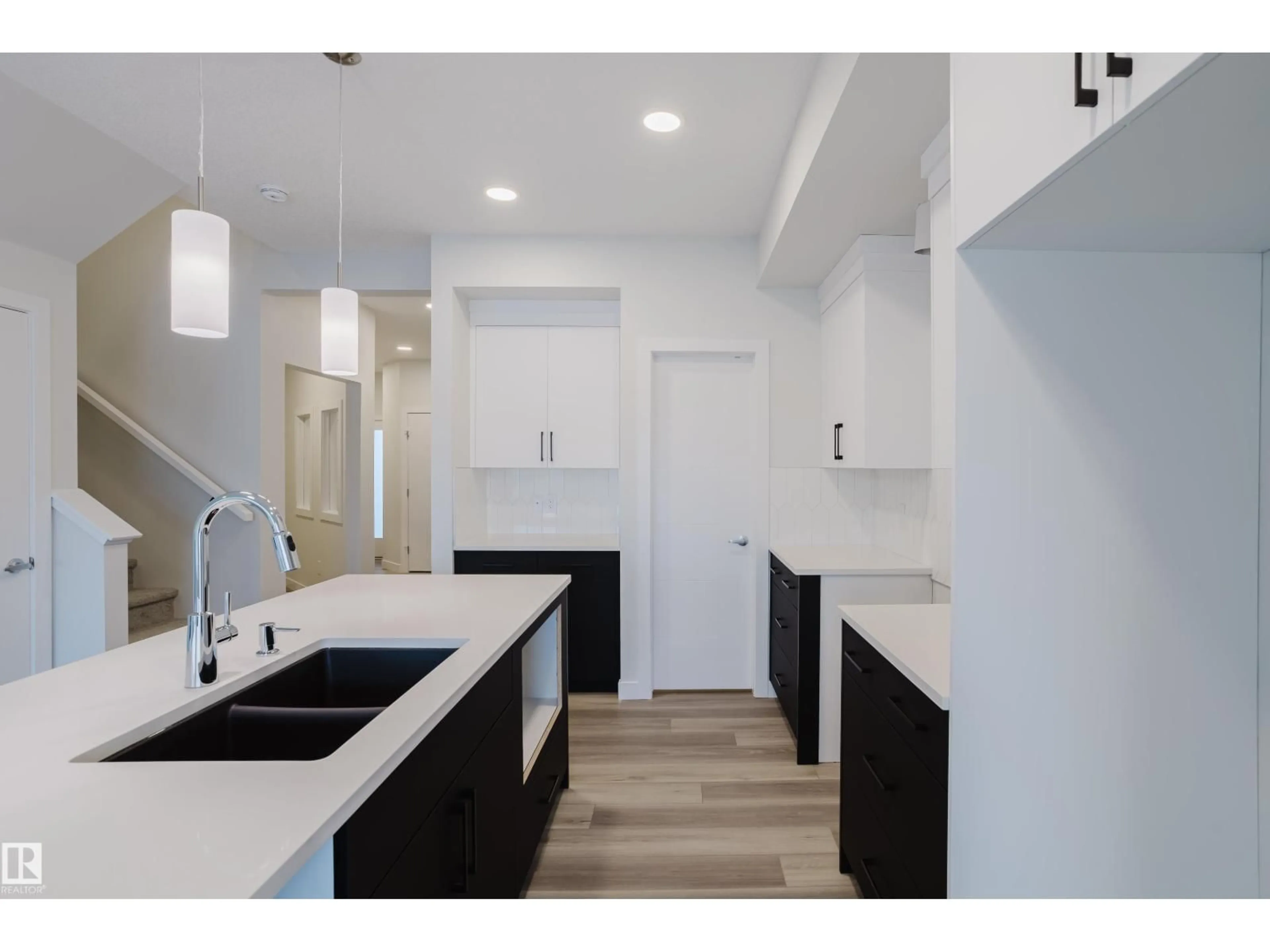 Open concept kitchen, ceramic/tile floor for 18647 19 AV, Edmonton Alberta T6M3M9