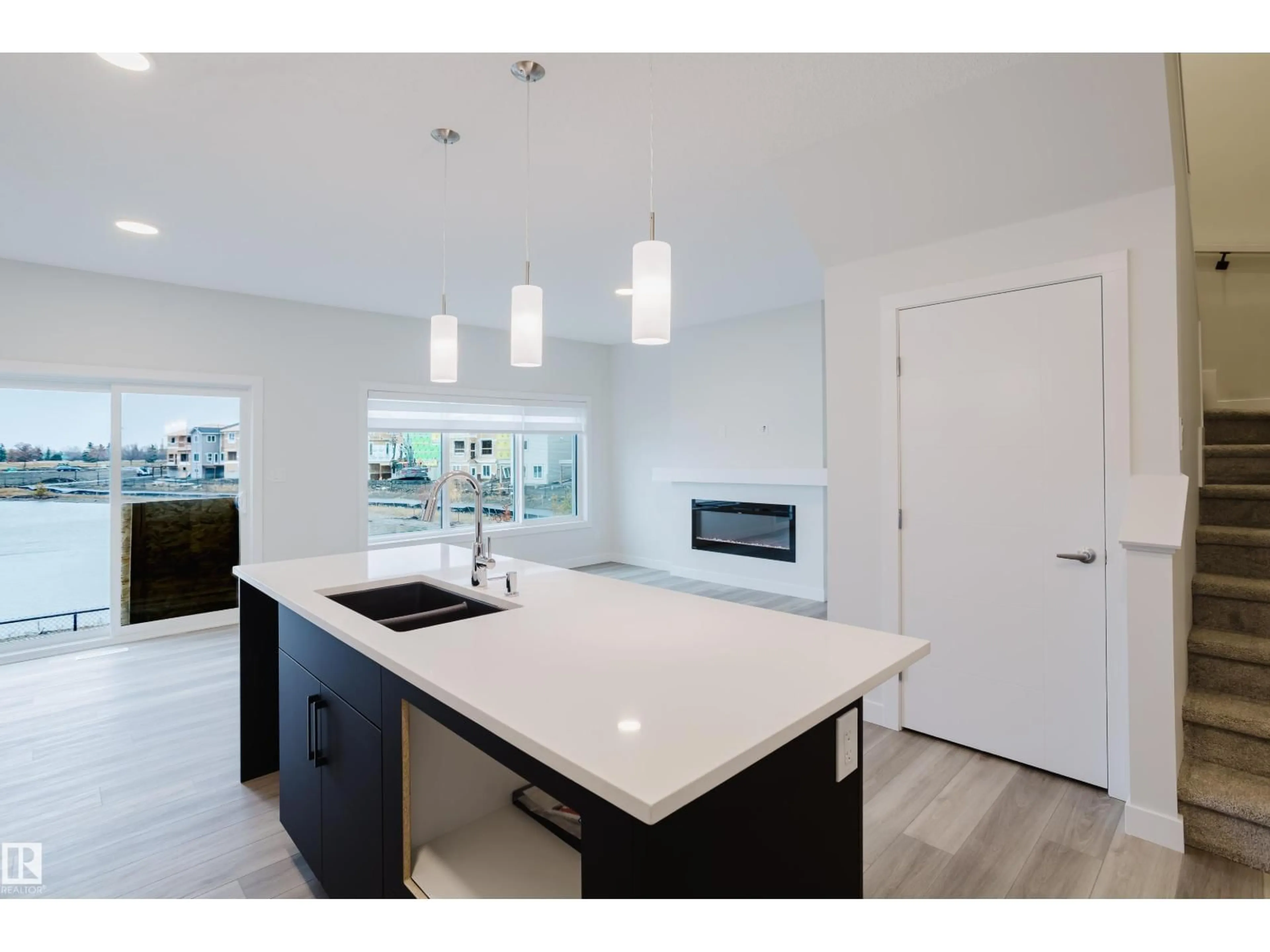 Open concept kitchen, unknown for 18647 19 AV, Edmonton Alberta T6M3M9