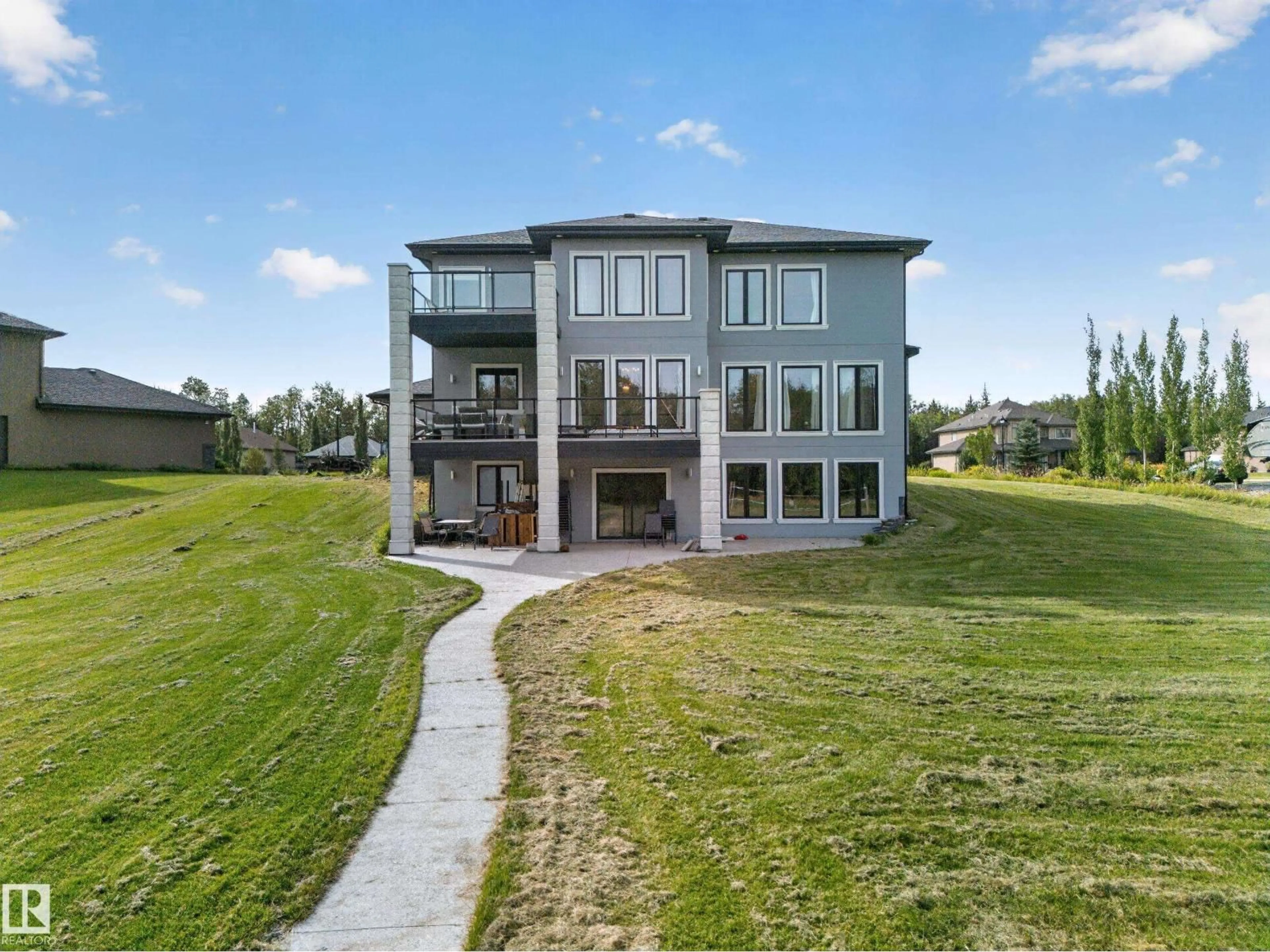 A pic from outside/outdoor area/front of a property/back of a property/a pic from drone, unknown for 24 26314 TWP ROAD 532 A, Rural Parkland County Alberta T7X4M1
