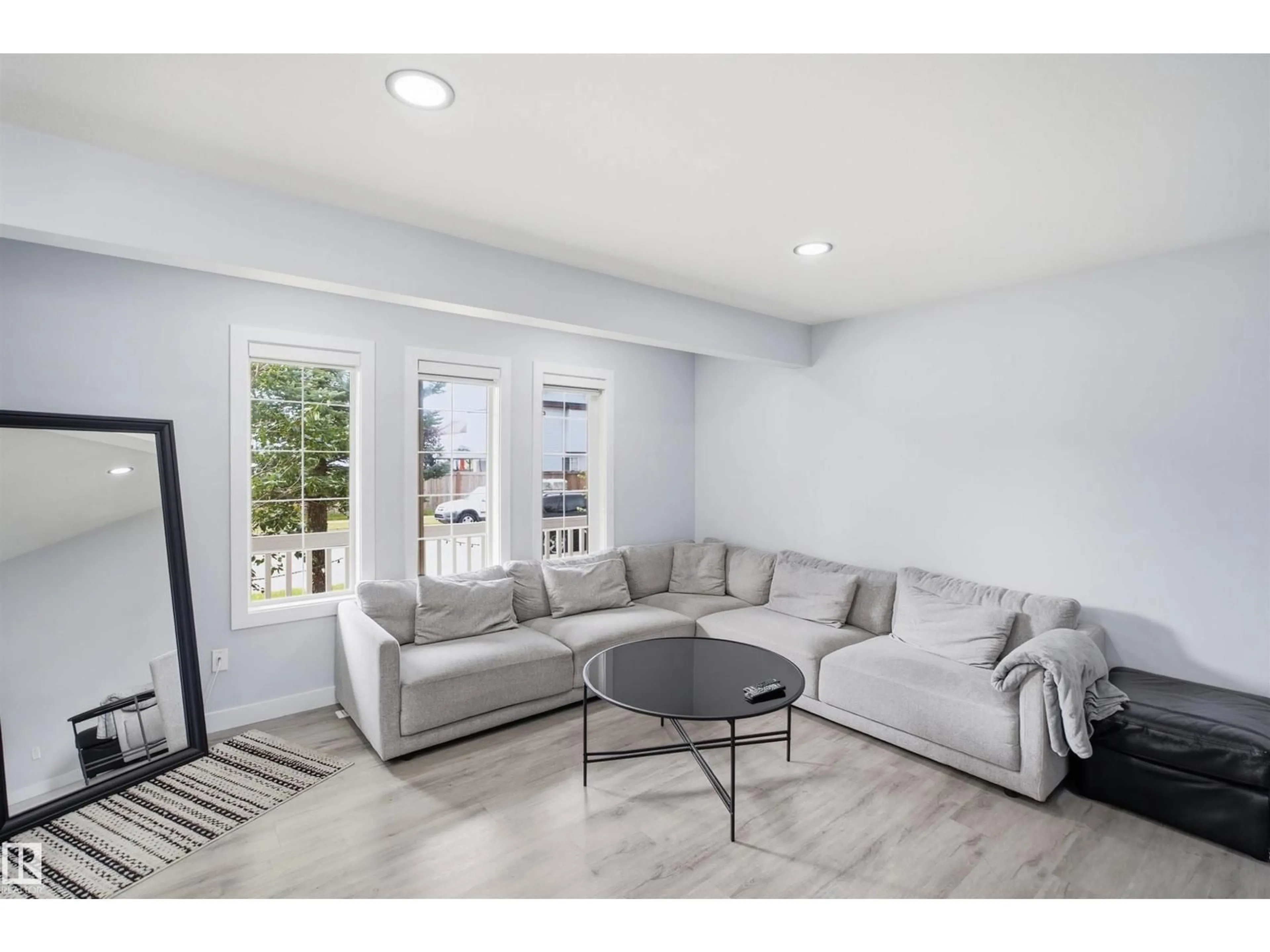 Living room with furniture, unknown for 2122 37 AV, Edmonton Alberta T6T1S2