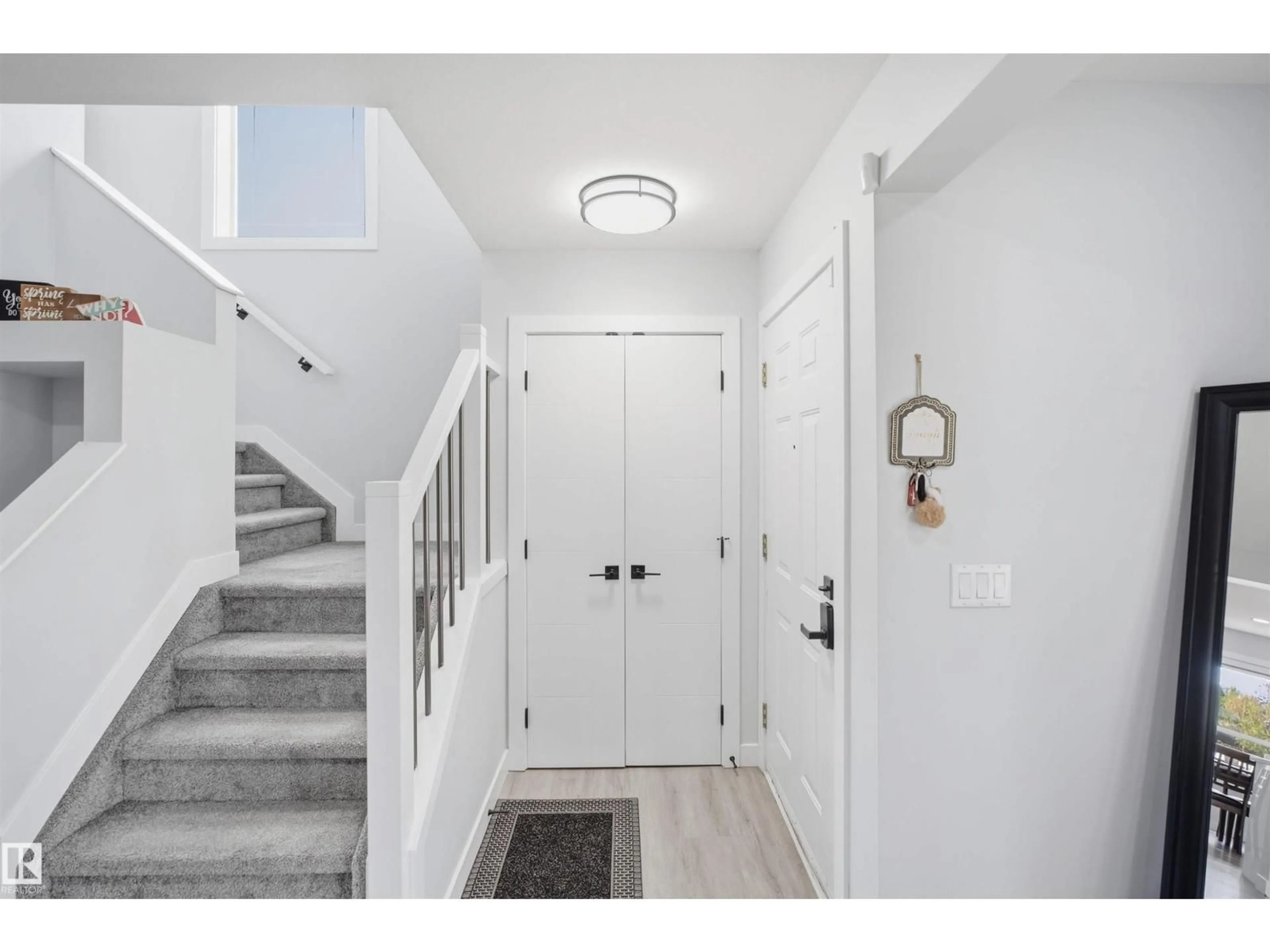 Indoor entryway for 2122 37 AV, Edmonton Alberta T6T1S2