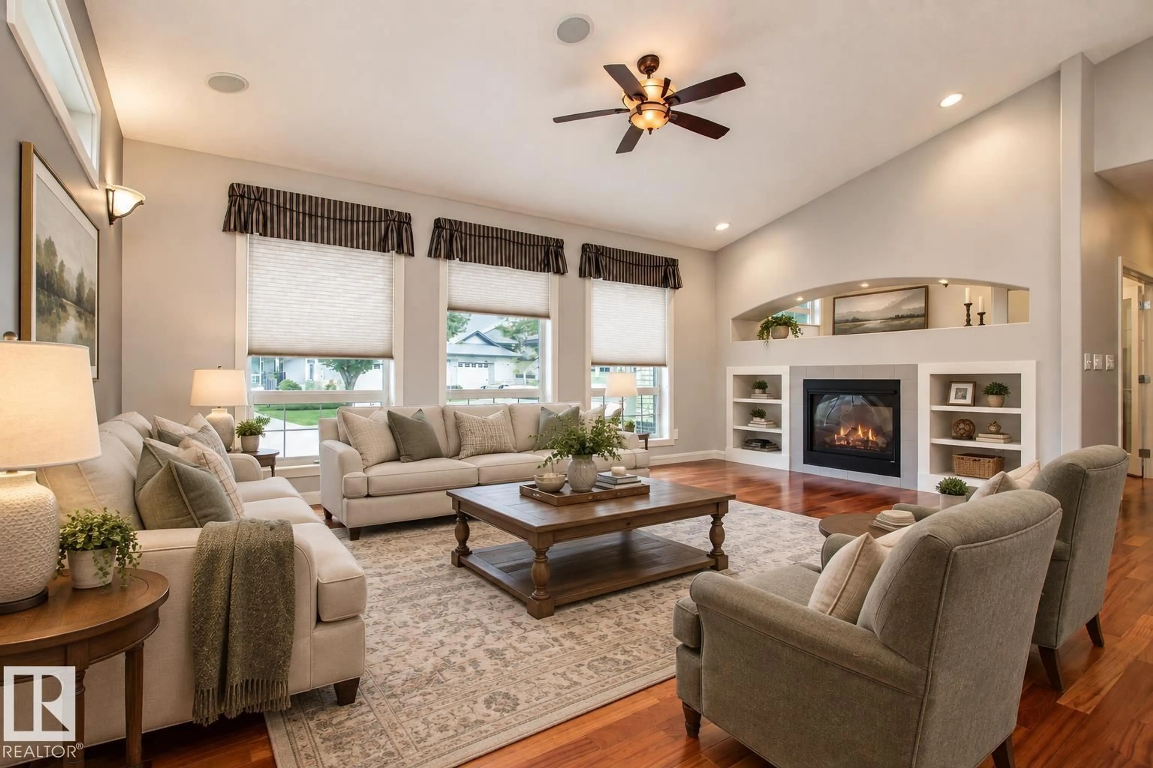 Living room with furniture, wood/laminate floor for 276 - 63 CRANFORD DR, Sherwood Park Alberta T8H0C6