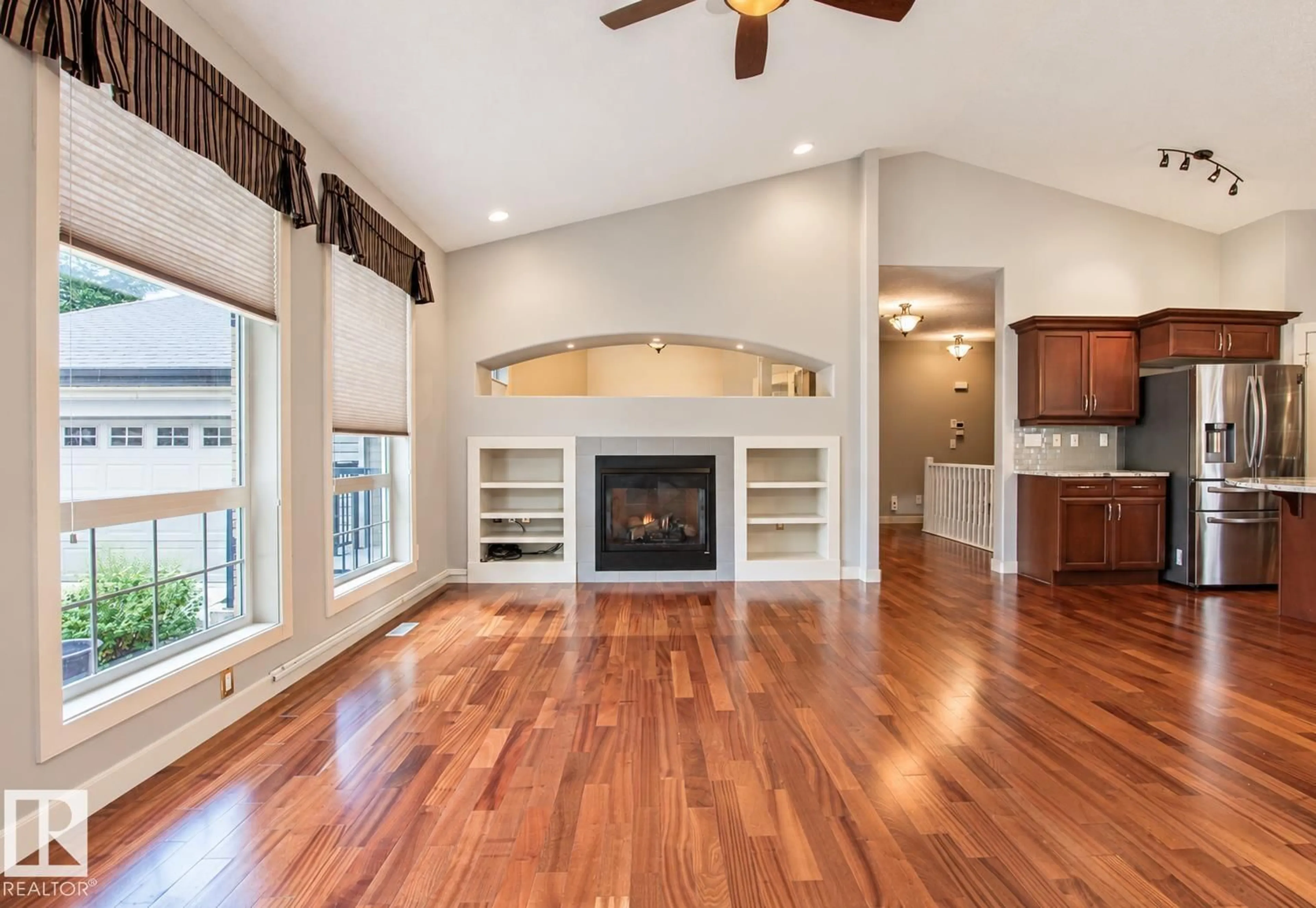 Living room with furniture, wood/laminate floor for 276 - 63 CRANFORD DR, Sherwood Park Alberta T8H0C6