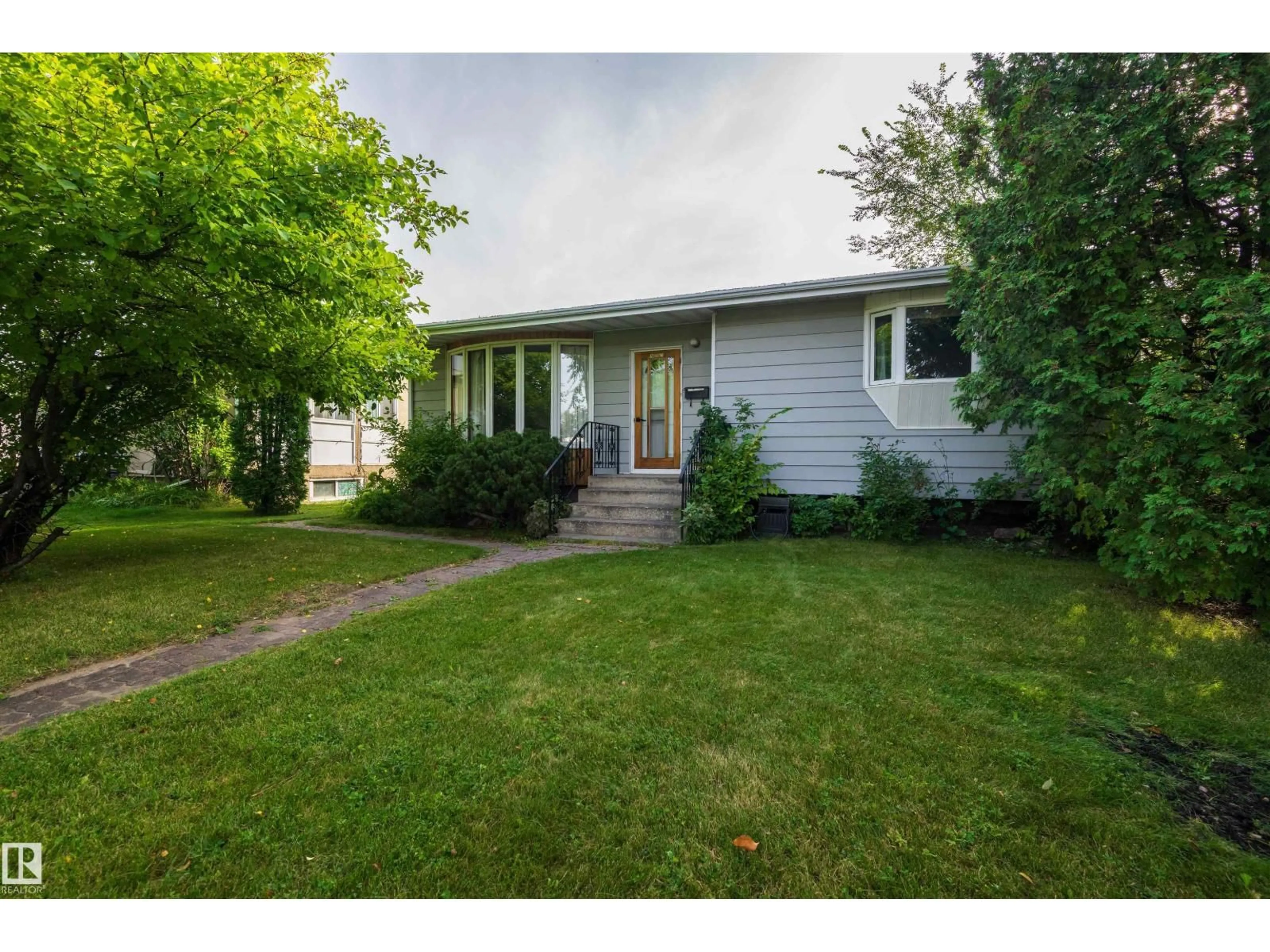 A pic from outside/outdoor area/front of a property/back of a property/a pic from drone, street for NW - 10207 71 ST, Edmonton Alberta T6A2V7