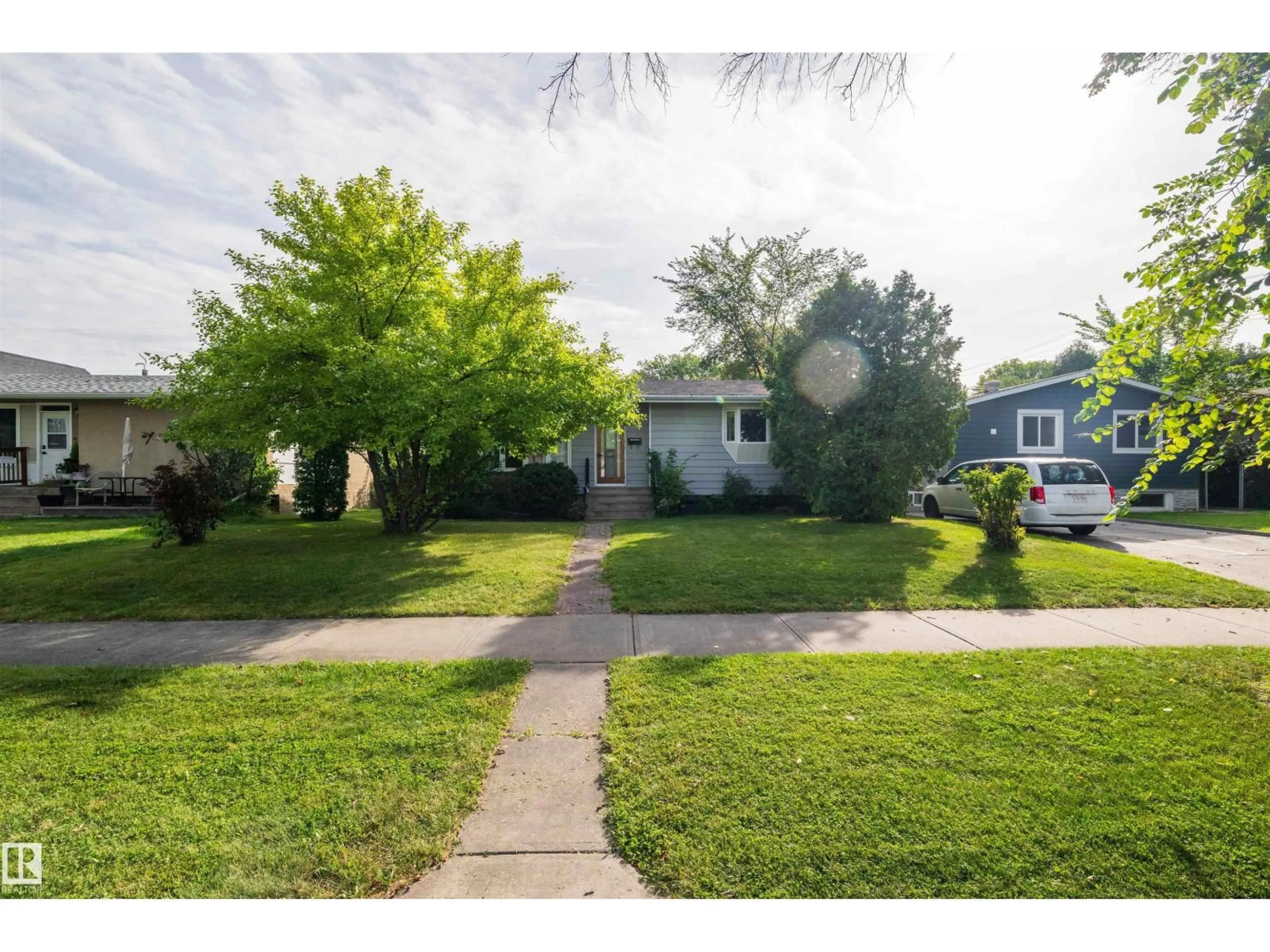A pic from outside/outdoor area/front of a property/back of a property/a pic from drone, street for NW - 10207 71 ST, Edmonton Alberta T6A2V7