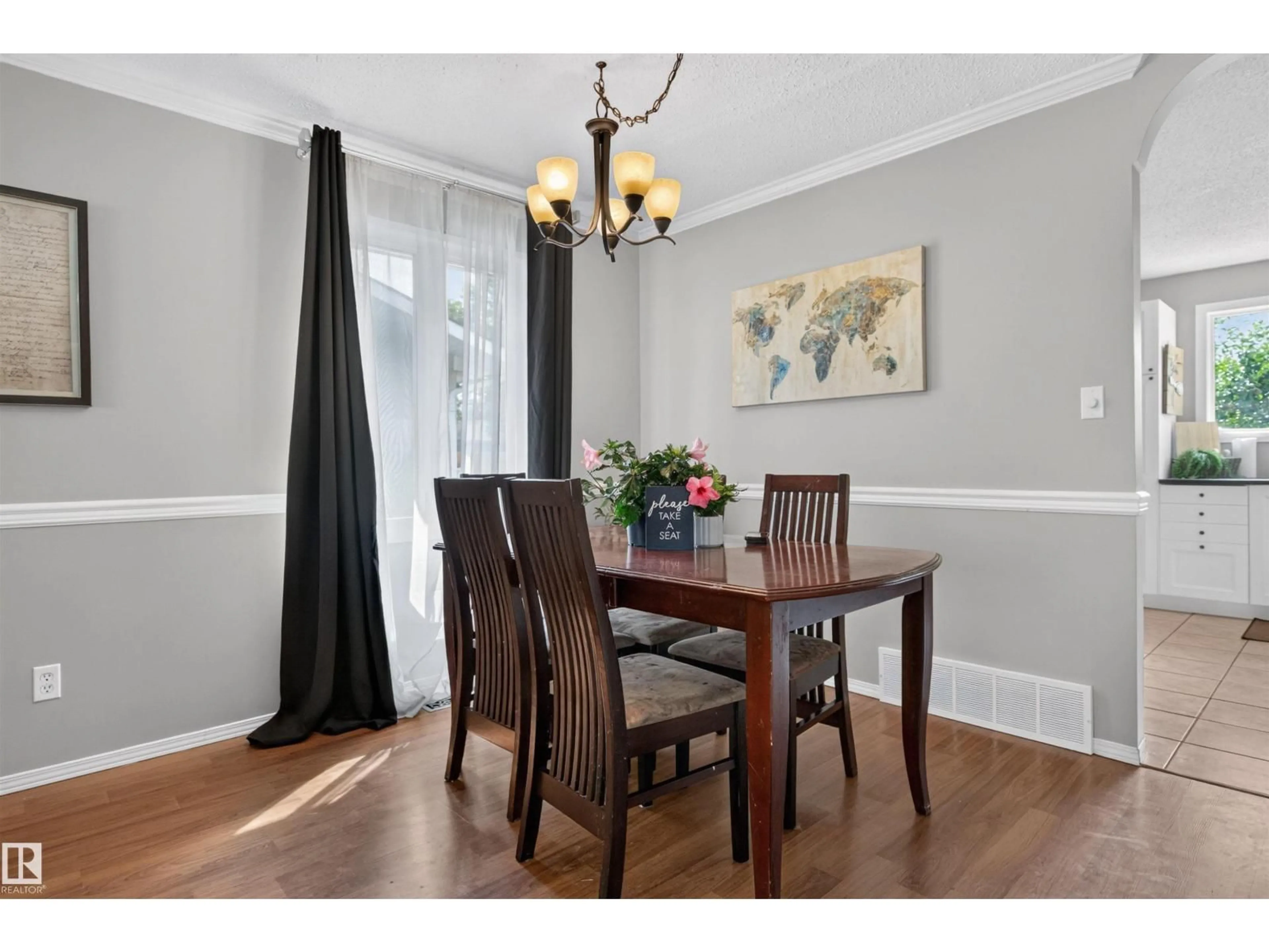 Dining room, wood/laminate floor for 3606 44 ST, Leduc Alberta T9E6A1