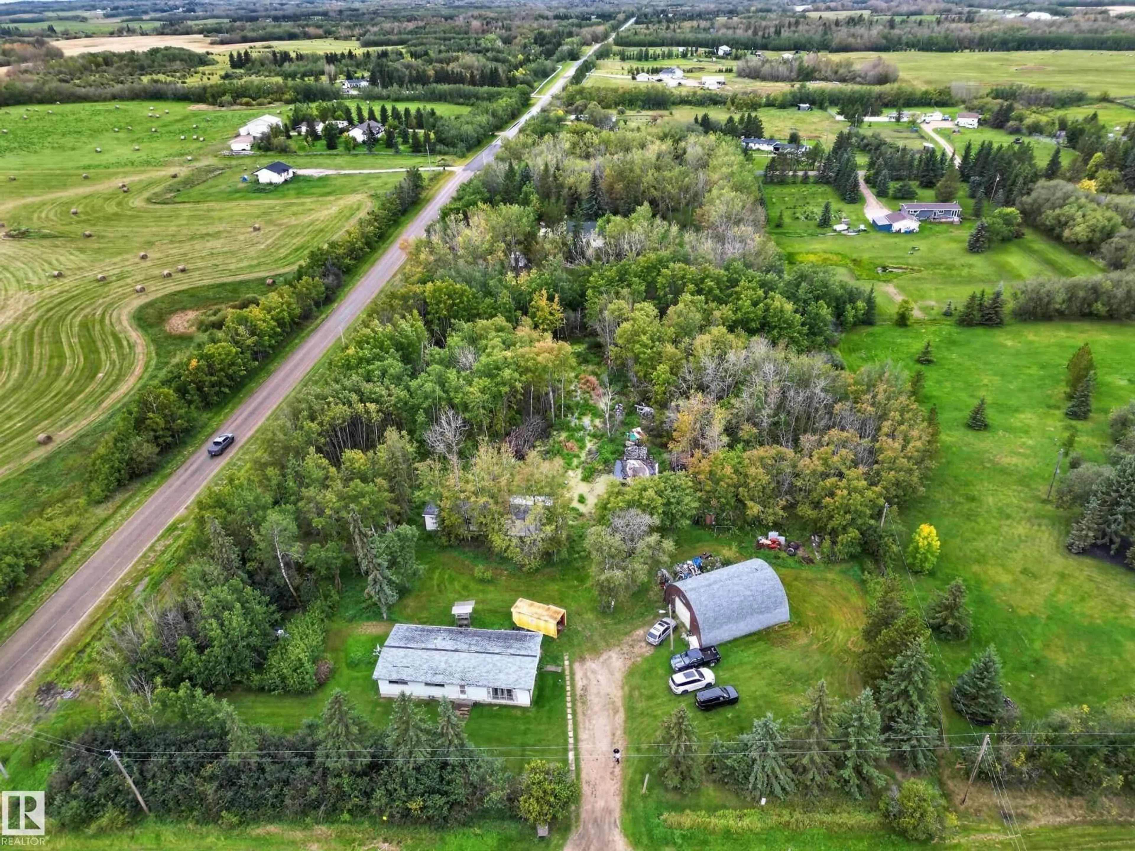 A pic from outside/outdoor area/front of a property/back of a property/a pic from drone, unknown for #2 - 21316 TWP ROAD 534, Rural Strathcona County Alberta T8G2B1