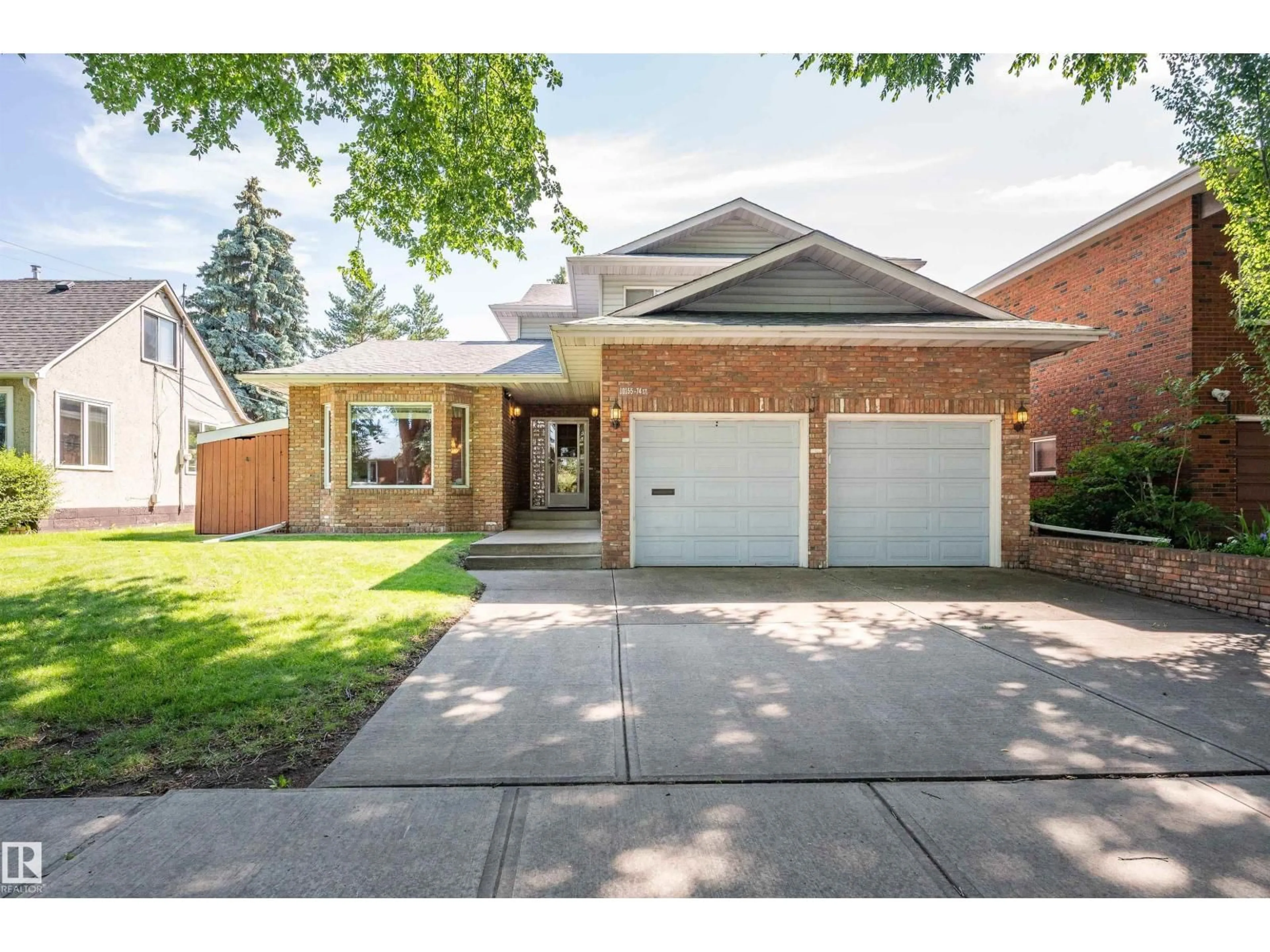 Home with brick exterior material, street for NW - 10155 74 ST, Edmonton Alberta T6A2X8