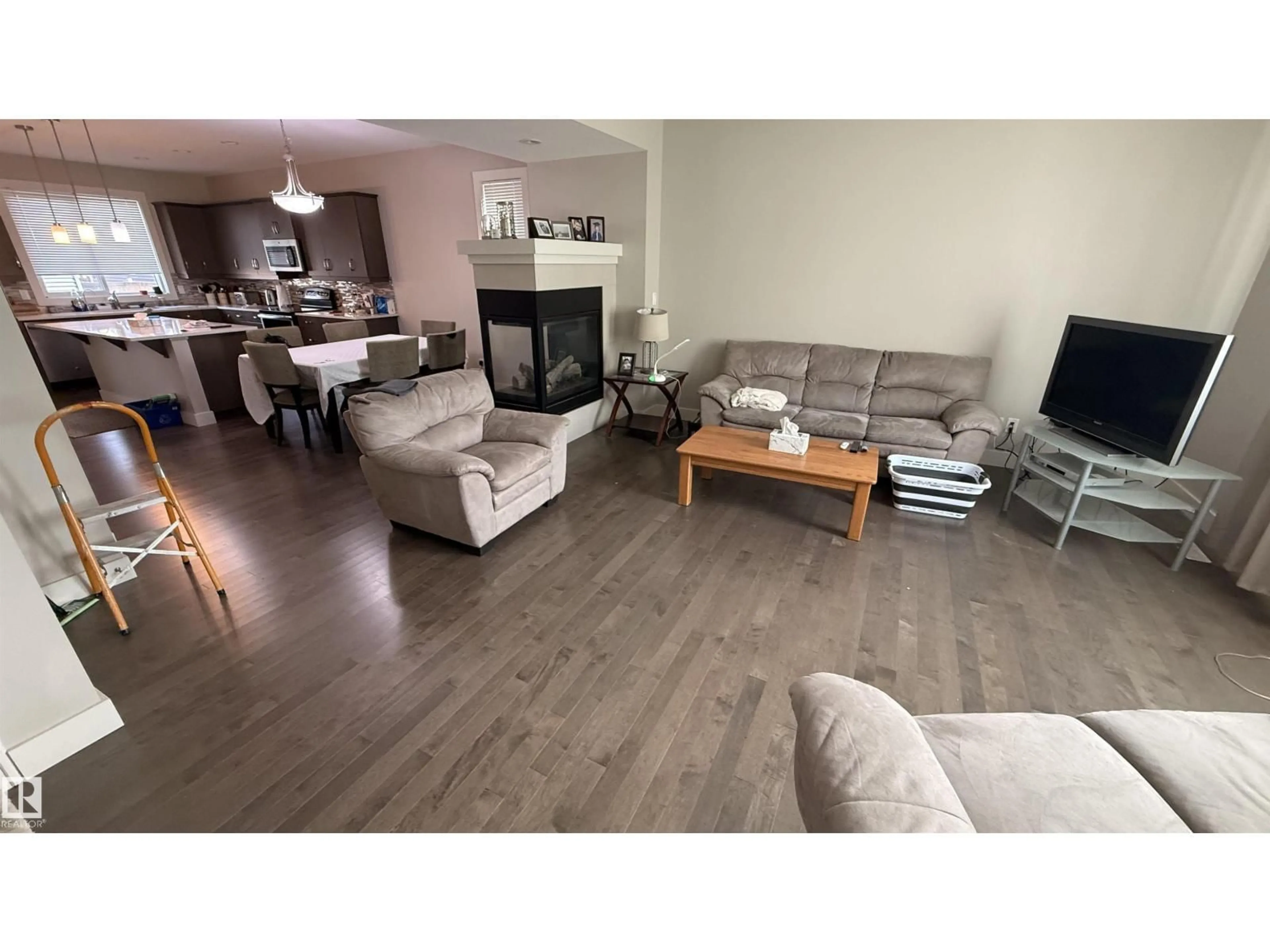 Living room with furniture, wood/laminate floor for 2294 ASPEN TR, Sherwood Park Alberta T8H0W4