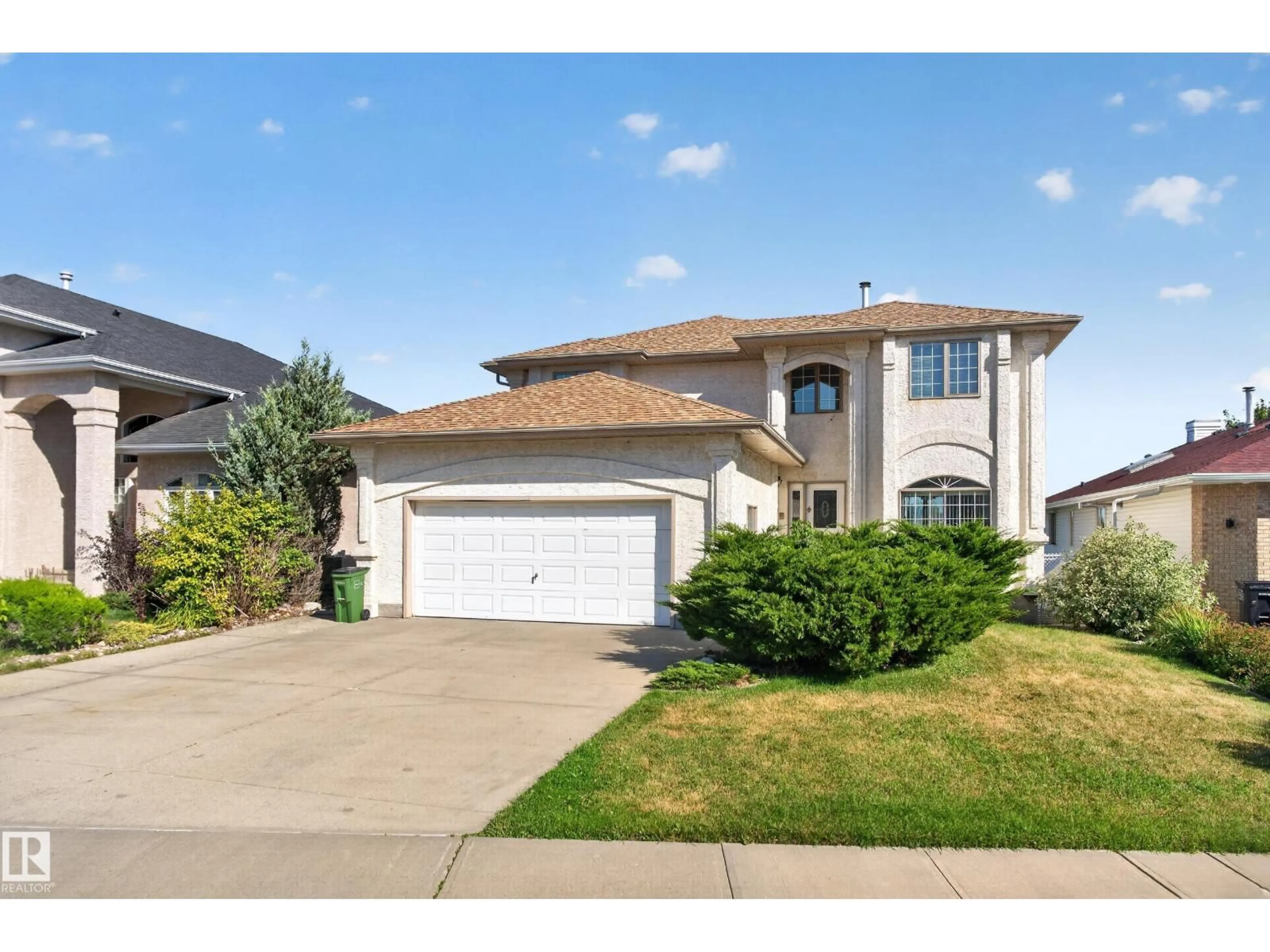 Home with vinyl exterior material, street for 15819 58 ST, Edmonton Alberta T5Y2R4