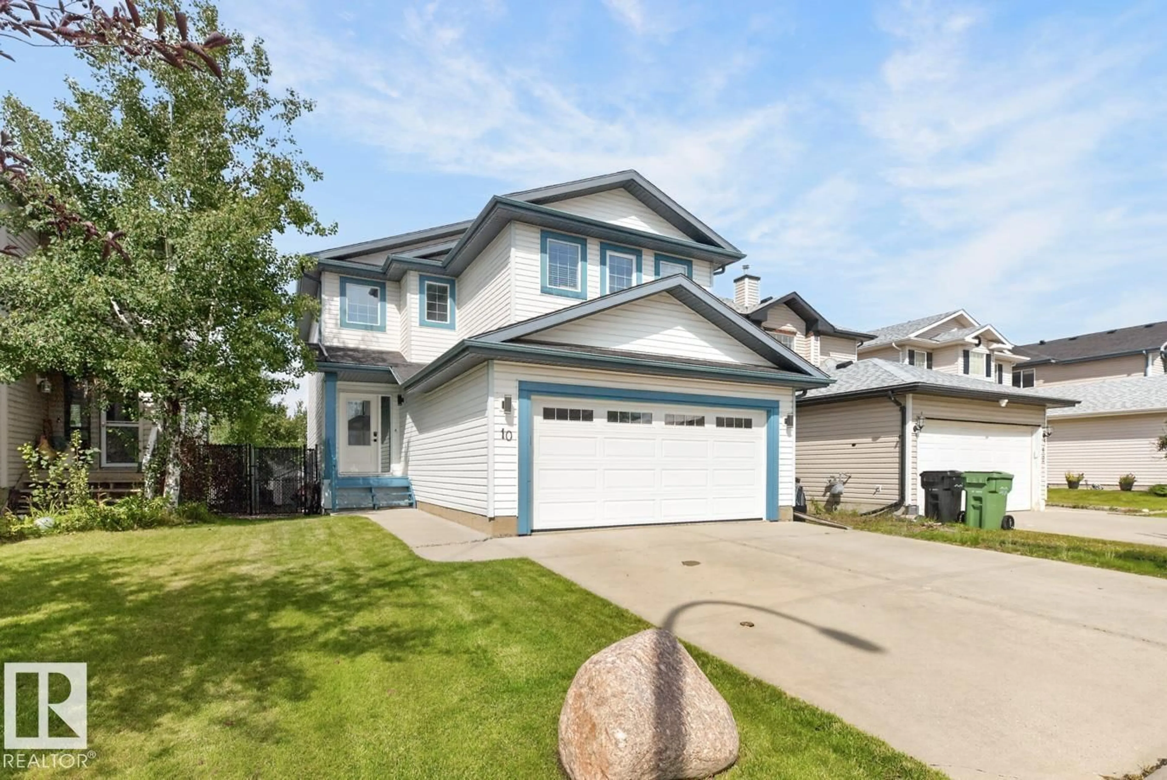 Home with vinyl exterior material, street for 10 DOUGLAS CR, Leduc Alberta T9E8P3