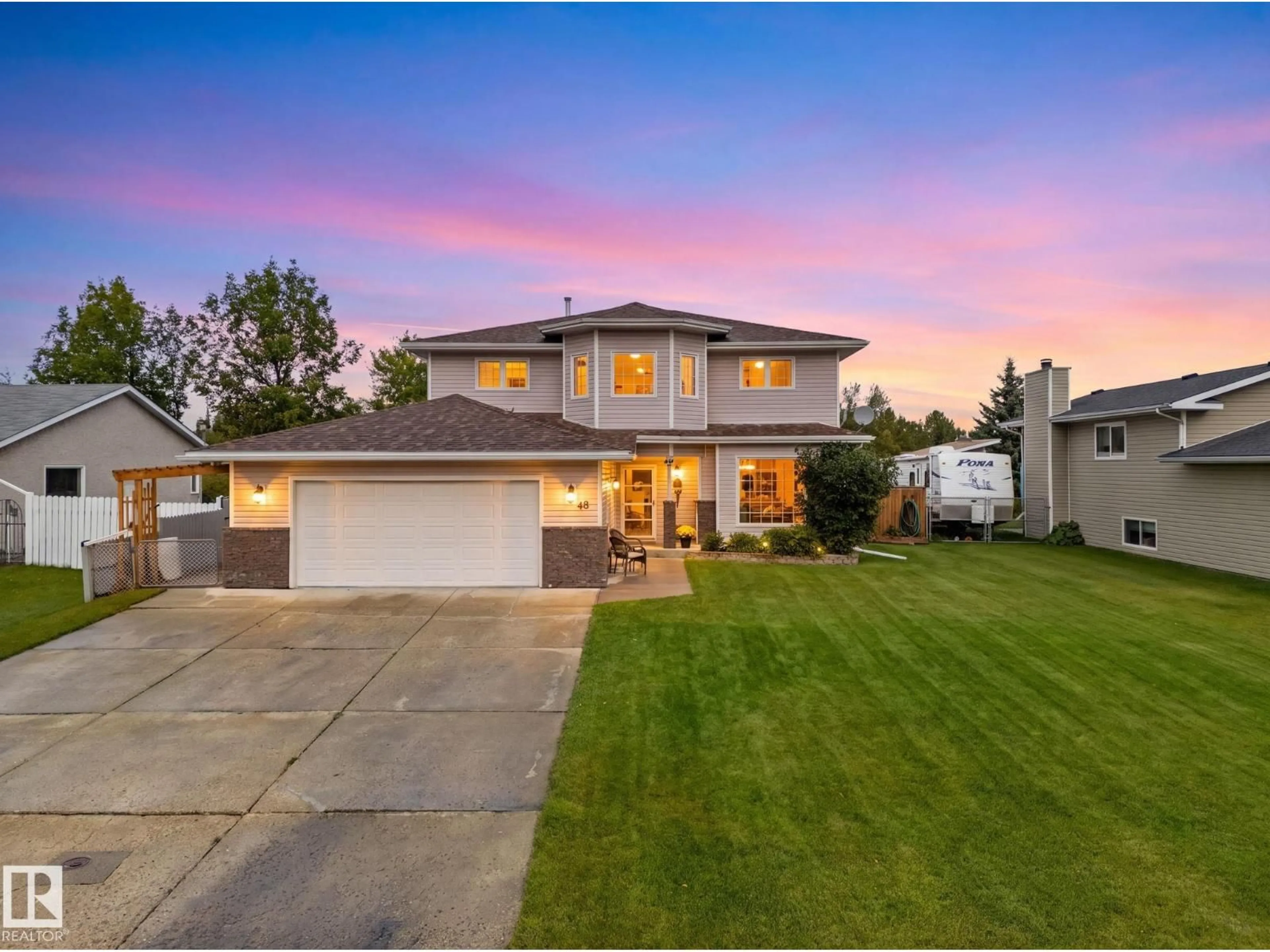 Home with vinyl exterior material, street for 48 MILL RD, Cardiff Alberta T8R1N7