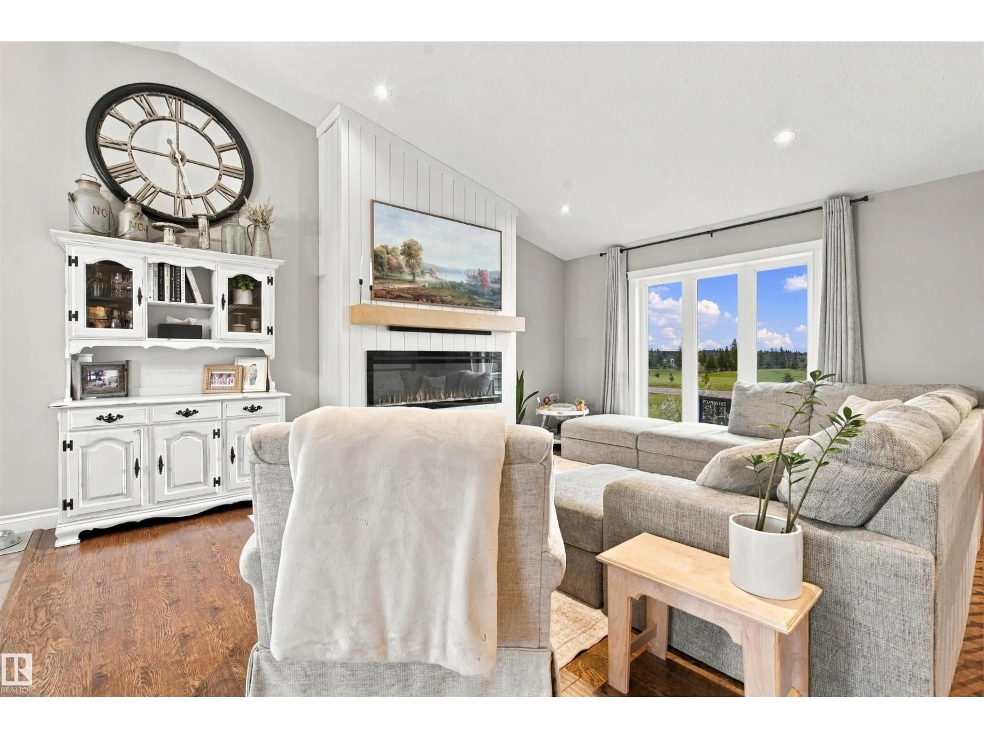 Living room with furniture, wood/laminate floor for 10 42230 TWP RD RD, Rural Bonnyville M.D. Alberta T9M1P2