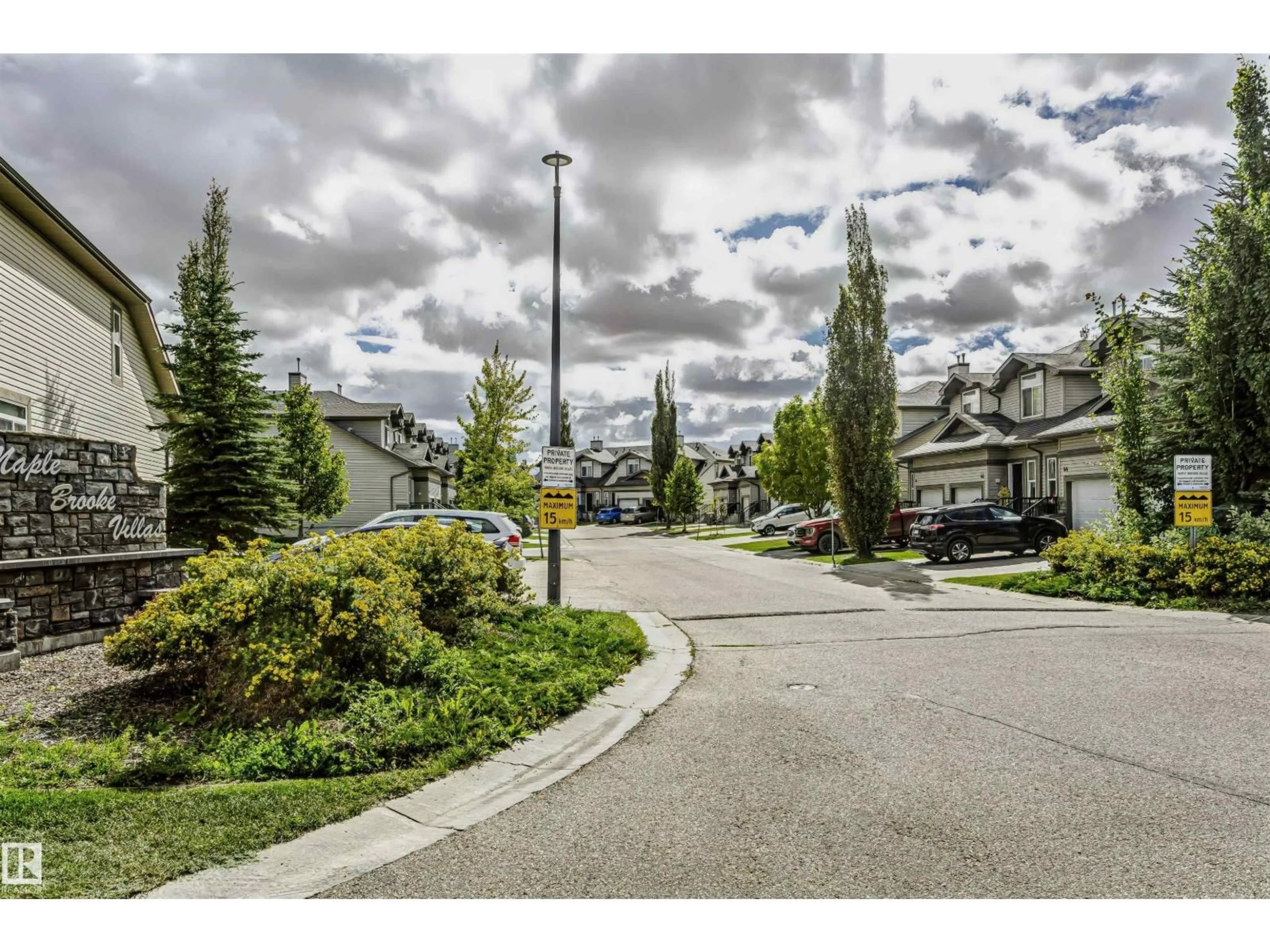 A pic from outside/outdoor area/front of a property/back of a property/a pic from drone, street for 30 - 9511 102 AV, Morinville Alberta T8R0C6