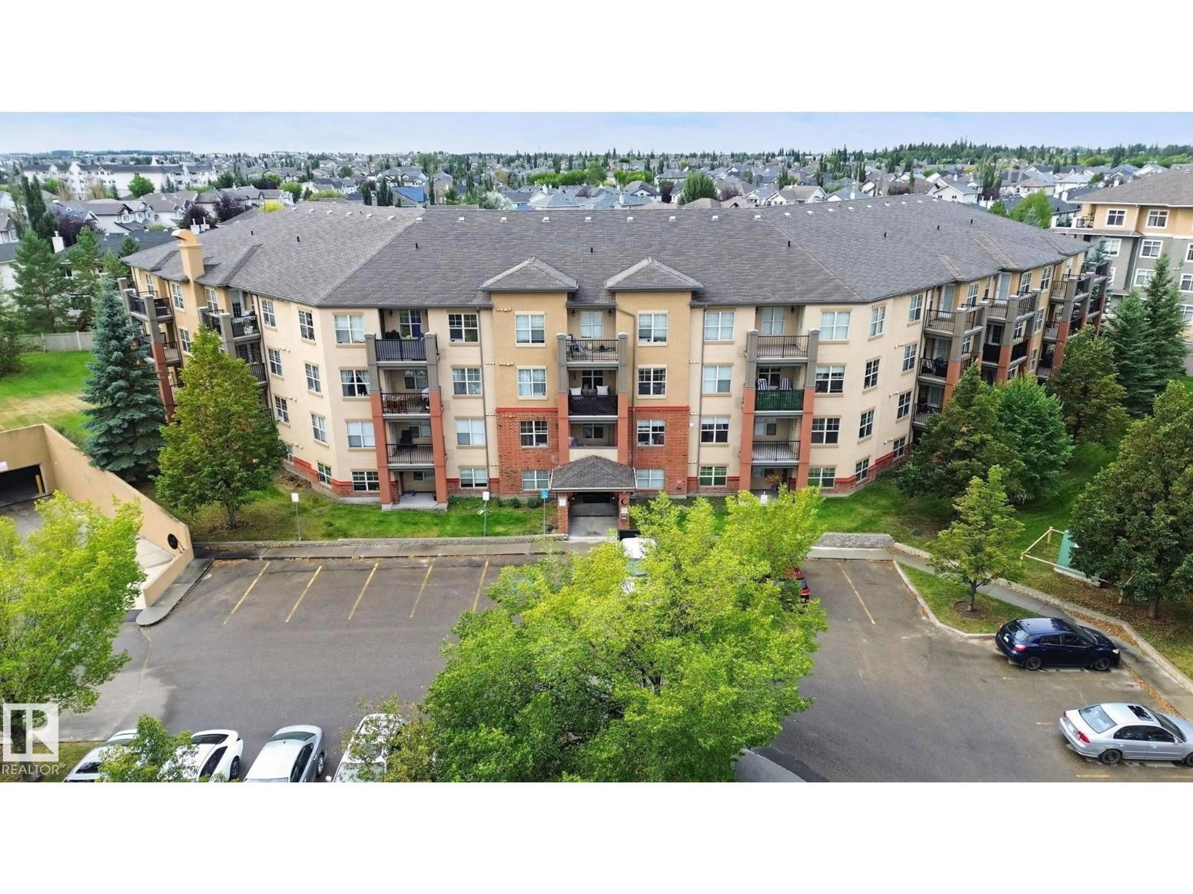 A pic from outside/outdoor area/front of a property/back of a property/a pic from drone, unknown for #406 - 11449 ELLERSLIE RD, Edmonton Alberta T6W1T2