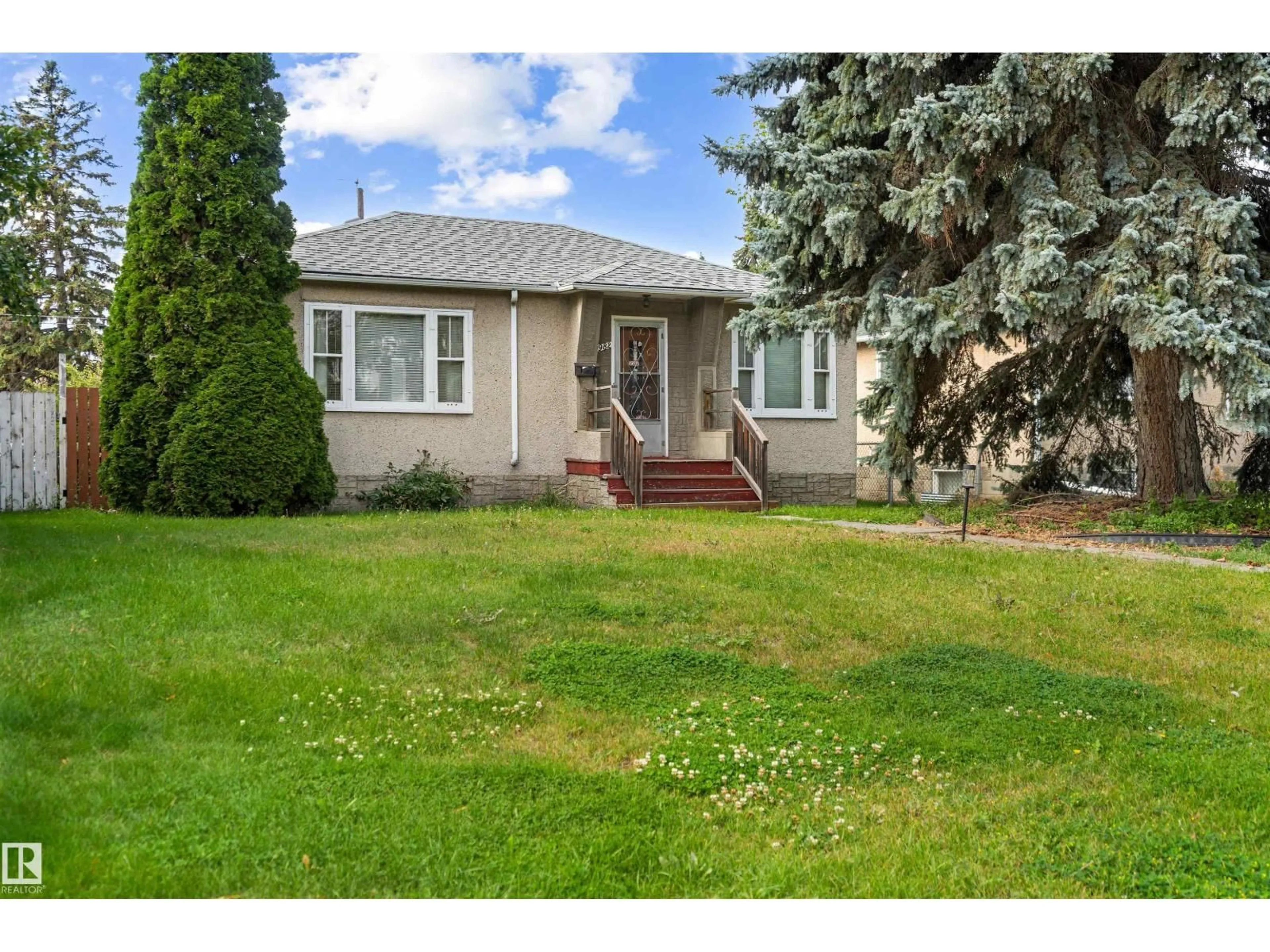Home with vinyl exterior material, street for 10982 117 ST NW, Edmonton Alberta T5H3N6