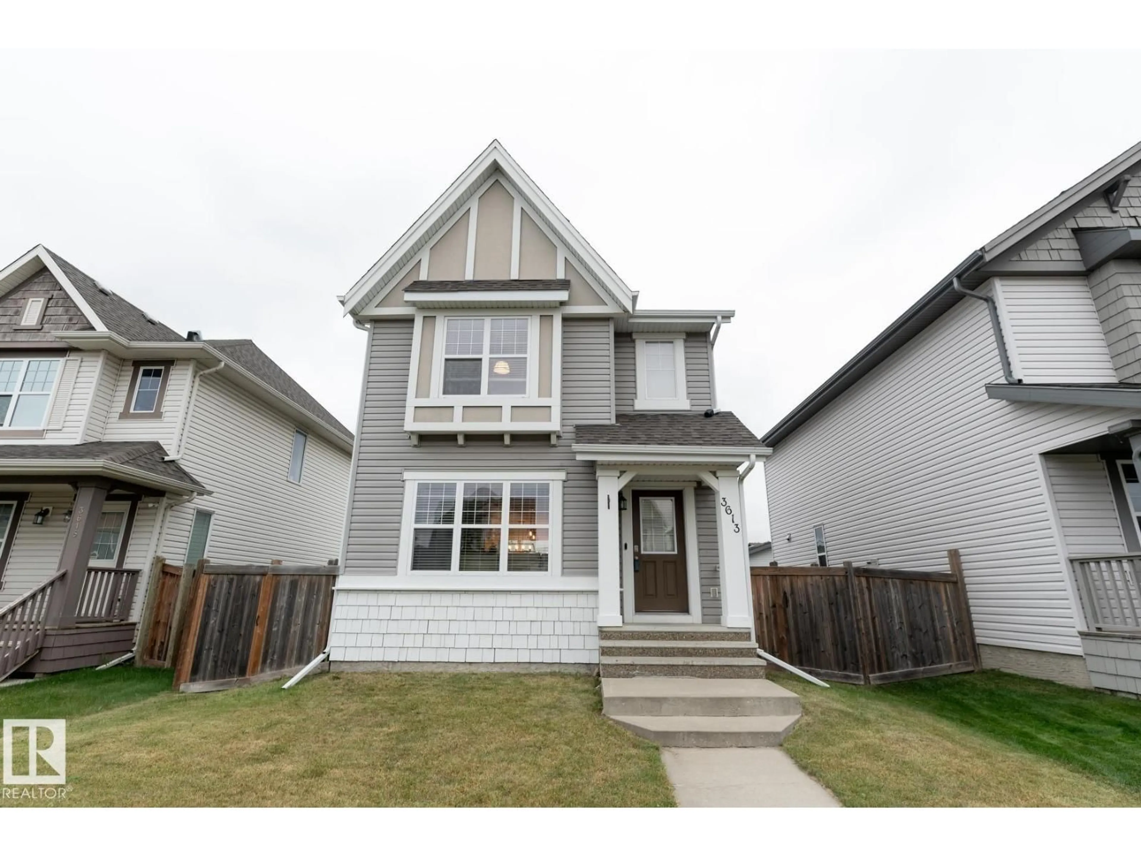 Home with vinyl exterior material, street for 3613 12 ST, Edmonton Alberta T6T0G1