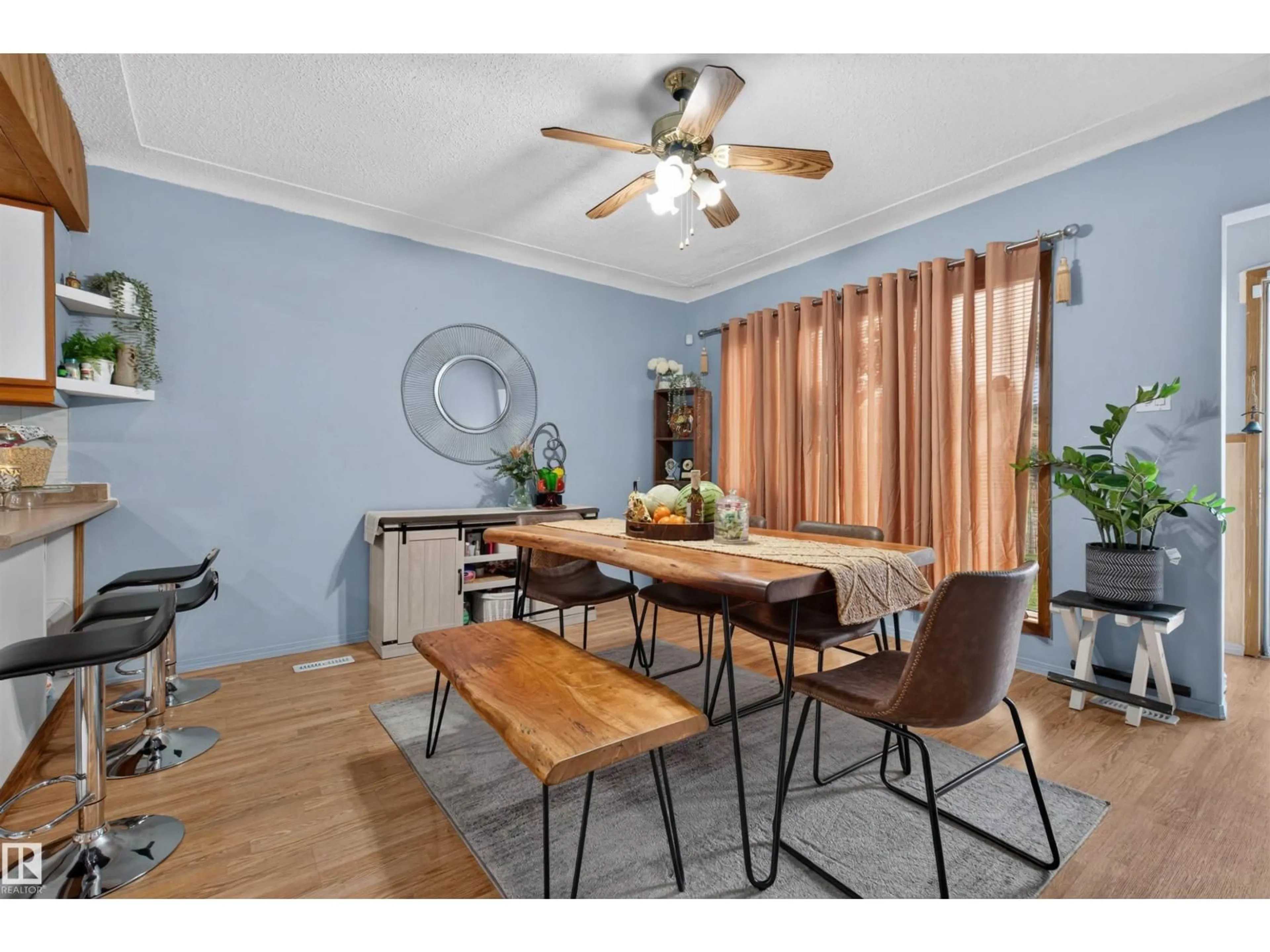 Dining room, wood/laminate floor for 11549 82 ST, Edmonton Alberta T5B2V7